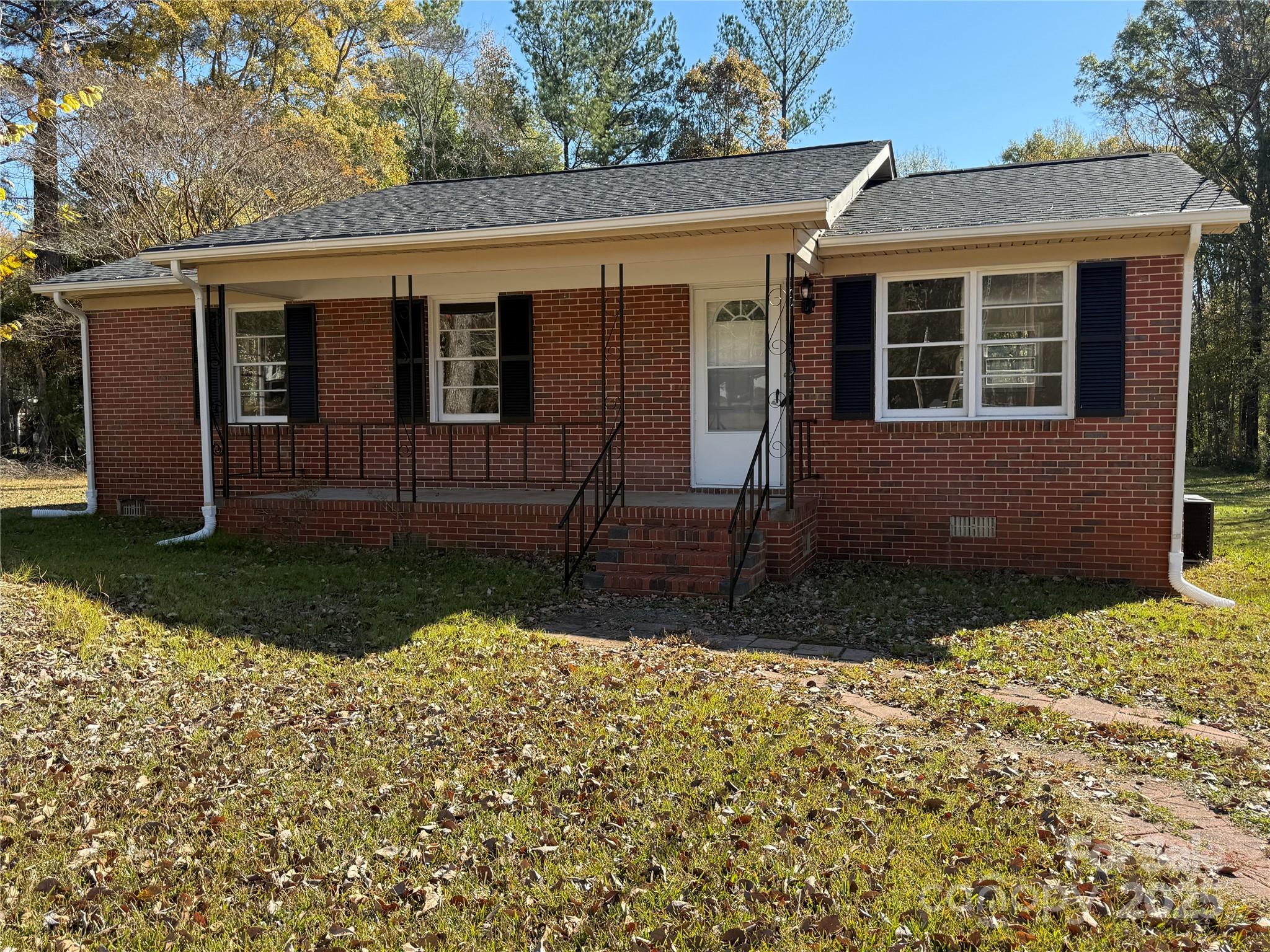 1154 Stringfellow Road Chester, SC 29706 - Photo 1 of 19 a front view of a house with garden