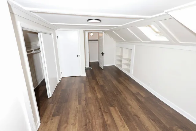 a view of entryway with wooden floor