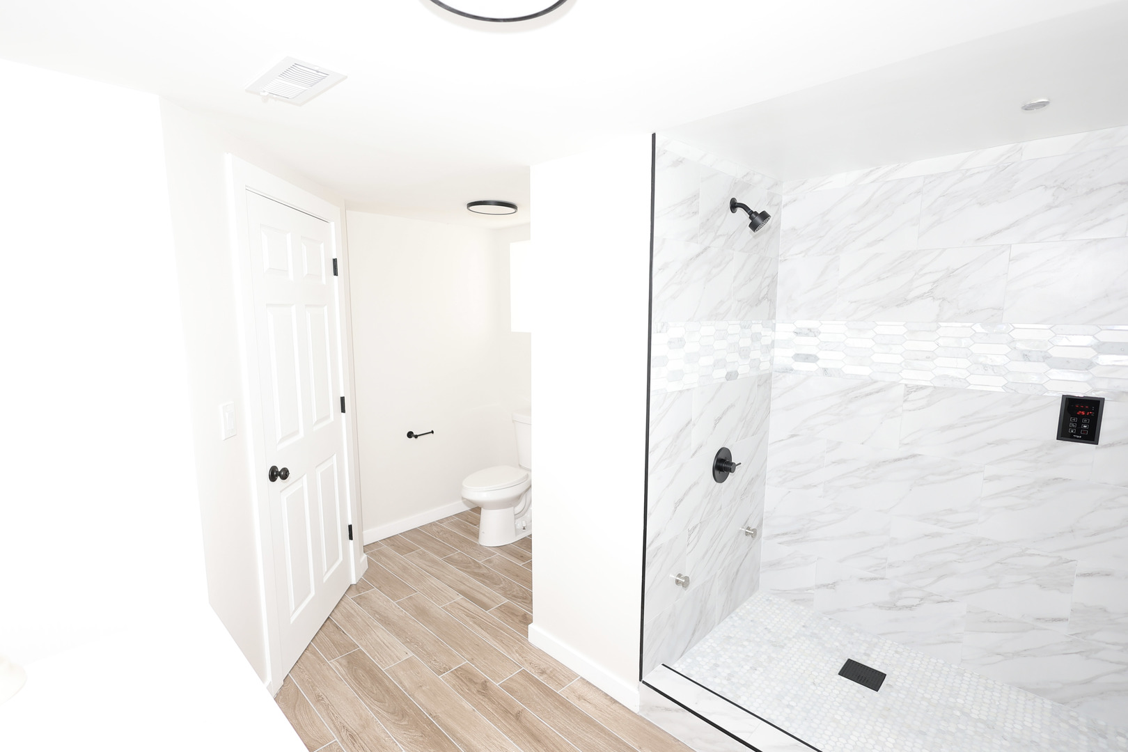 1724 West 105th Street Chicago, IL 60643 - Photo 26 of 34 a bathroom with a bathtub and a shower