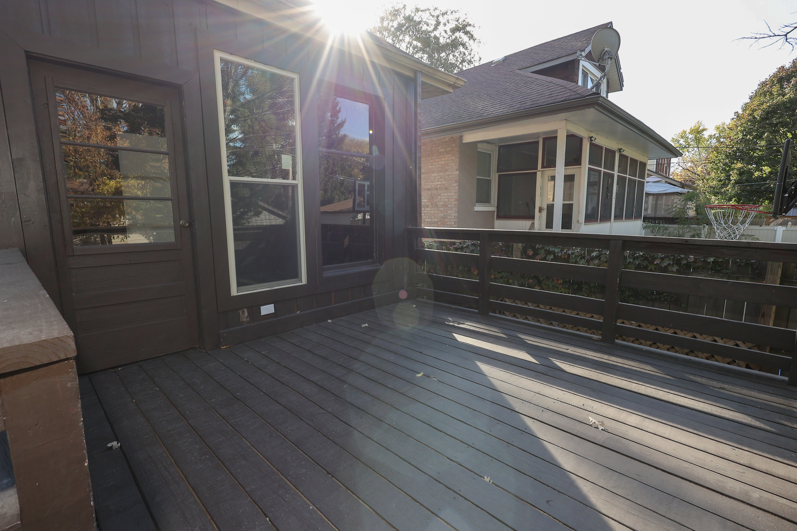 1724 West 105th Street Chicago, IL 60643 - Photo 32 of 34 a view of a house with a large window and wooden floor