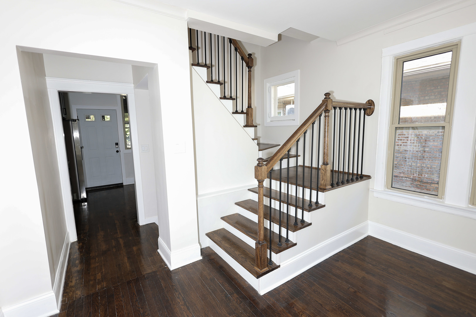 1724 West 105th Street Chicago, IL 60643 - Photo 6 of 34 a view of entryway with wooden floor and stairs