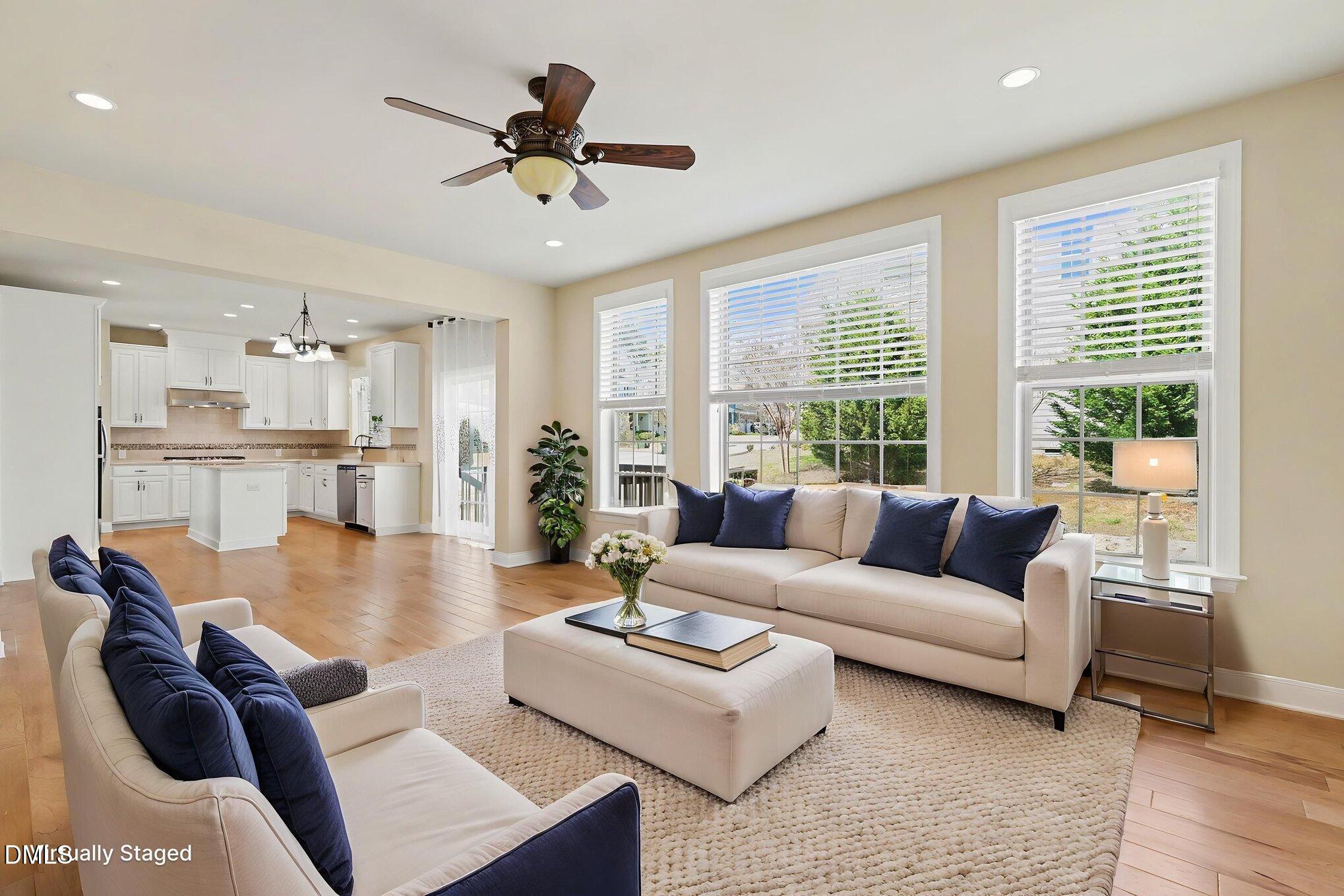 351 Gartrell Way Cary, NC 27519 - Photo 11 of 51 a living room with furniture and a large window