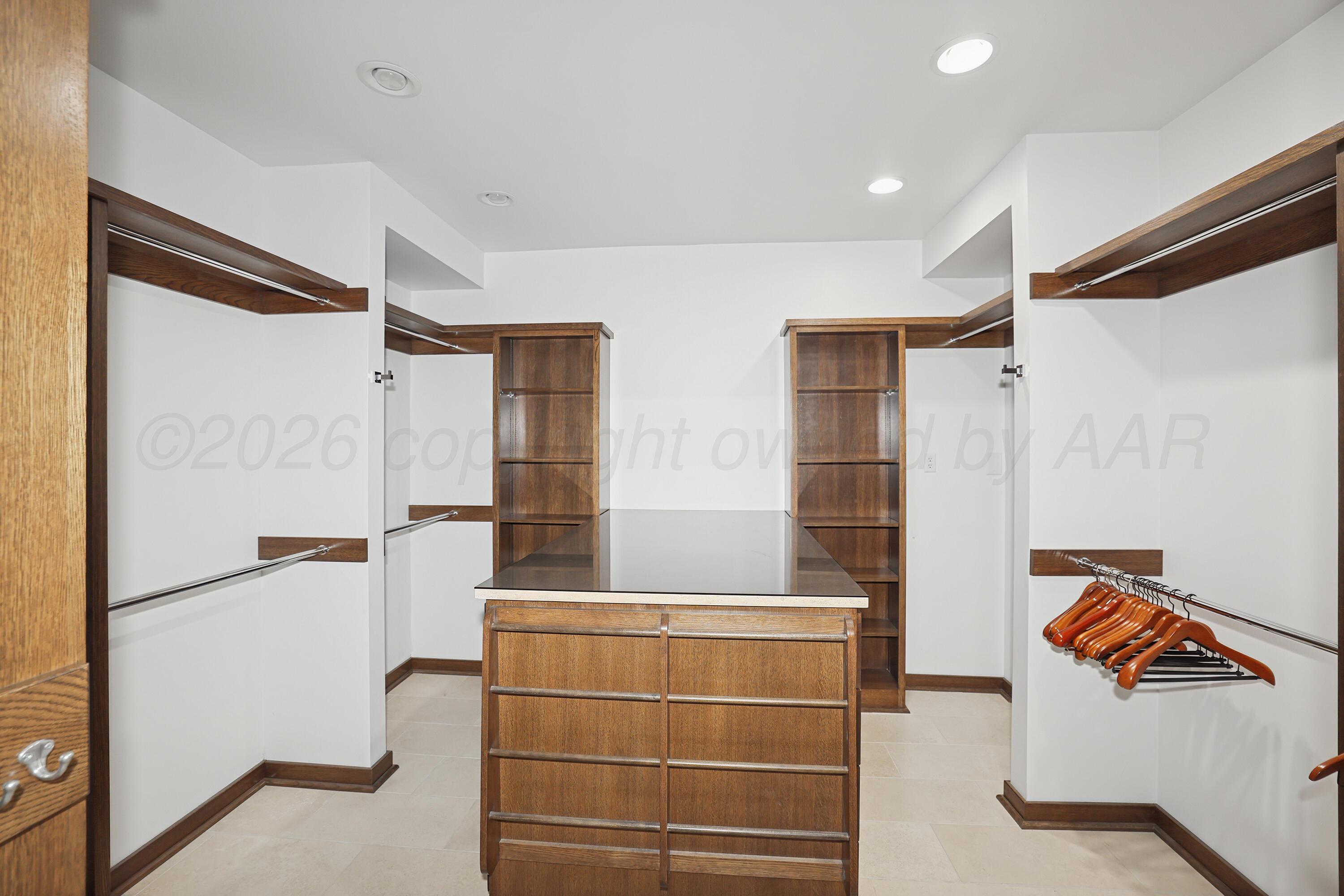 2 Woodstone Street Amarillo, TX 79106 - Photo 20 of 34 a bathroom with a sink and a shower