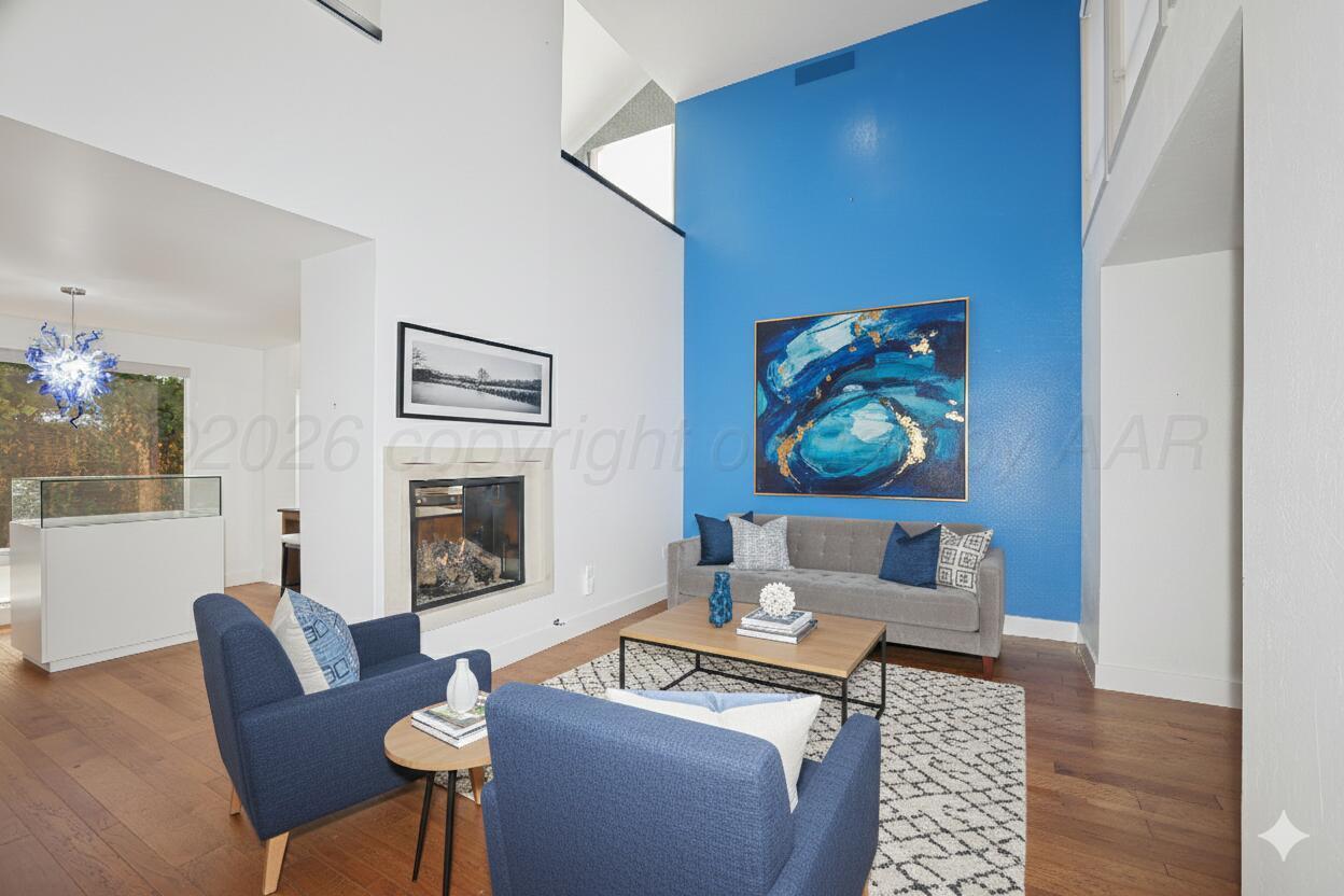 2 Woodstone Street Amarillo, TX 79106 - Photo 2 of 34 a living room with furniture and a fireplace