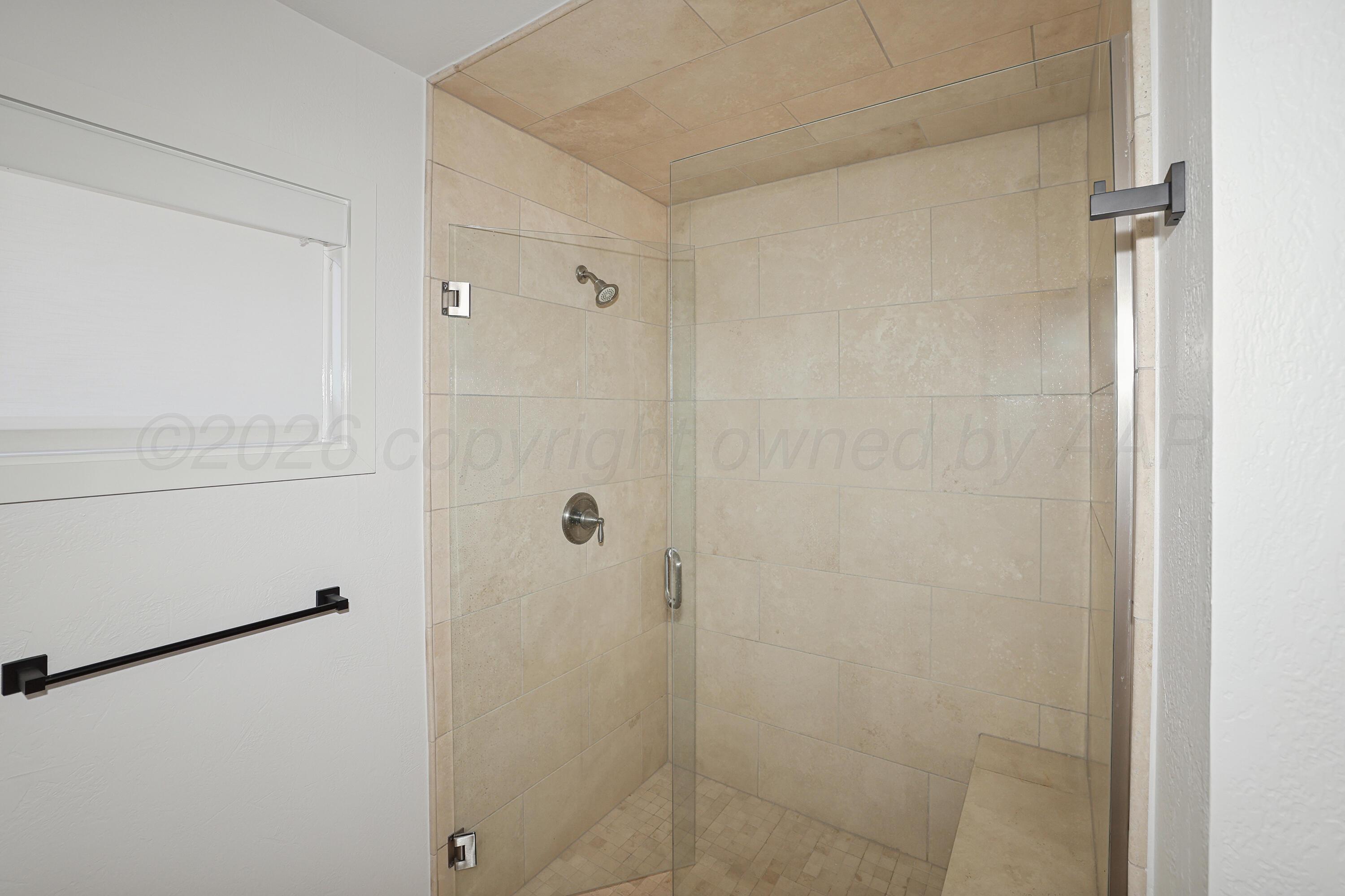 2 Woodstone Street Amarillo, TX 79106 - Photo 26 of 34 a bathroom with a shower