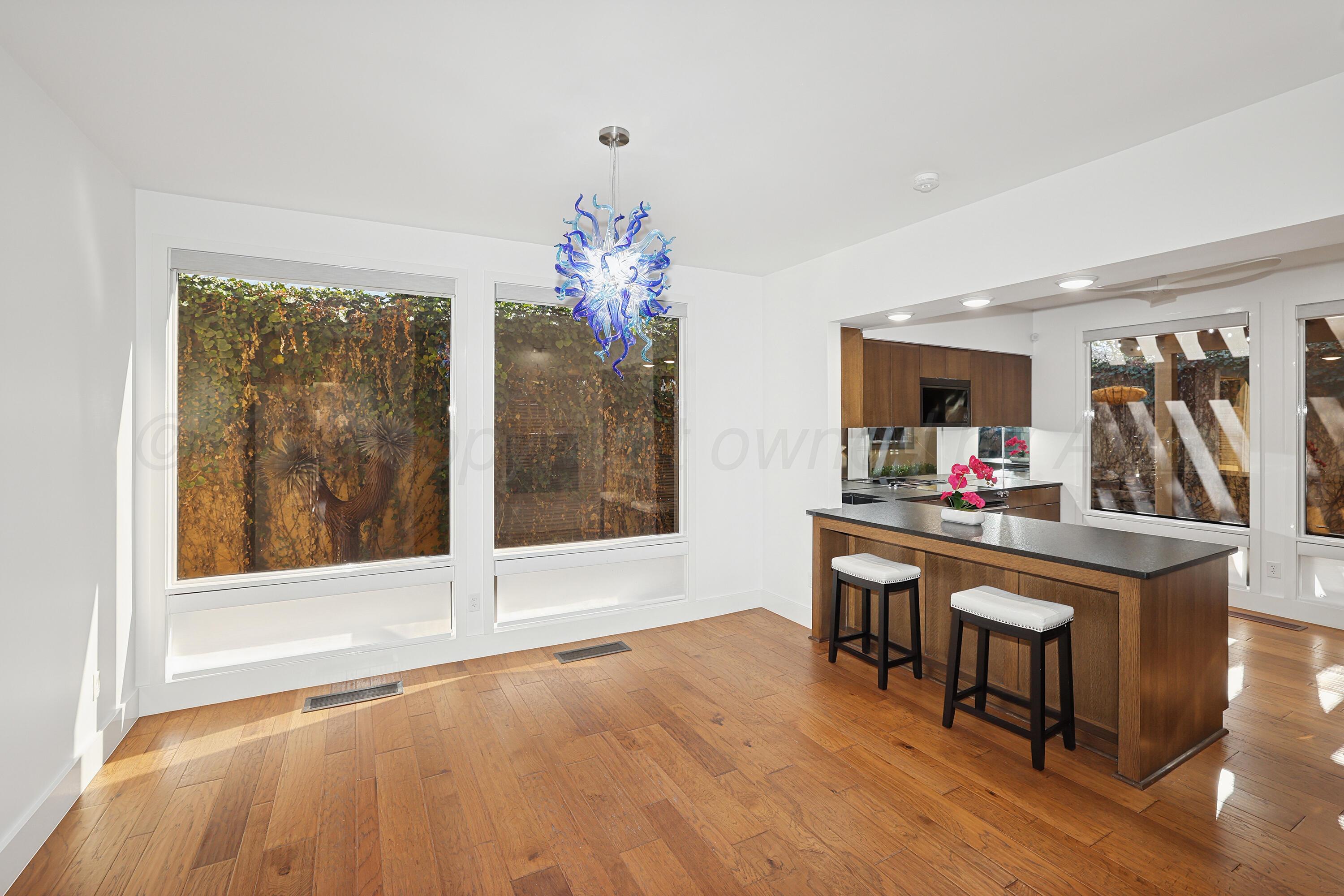 2 Woodstone Street Amarillo, TX 79106 - Photo 9 of 34 a living room with furniture and a flat screen tv