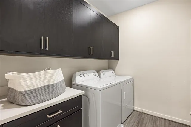 a living room with furniture a rug and a window