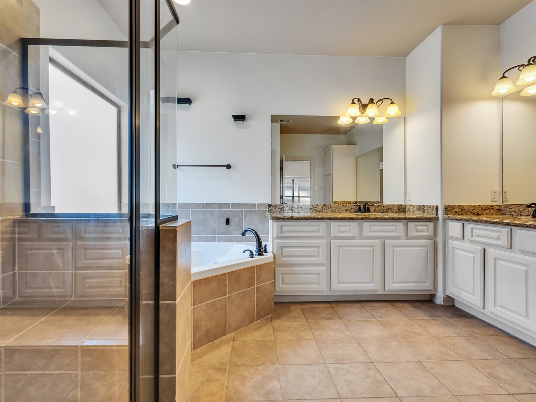 2540 Prospect Street, Unit B Houston, TX 77004 - Photo 25 of 37 a bathroom with a tub sink and mirror
