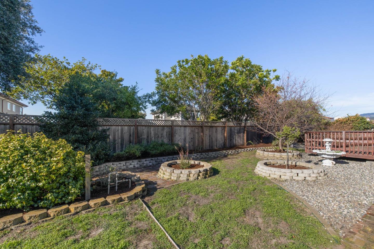 708 Johnston Street Half Moon Bay, CA 94019 - Photo 16 of 41 a view of a chair and table in backyard