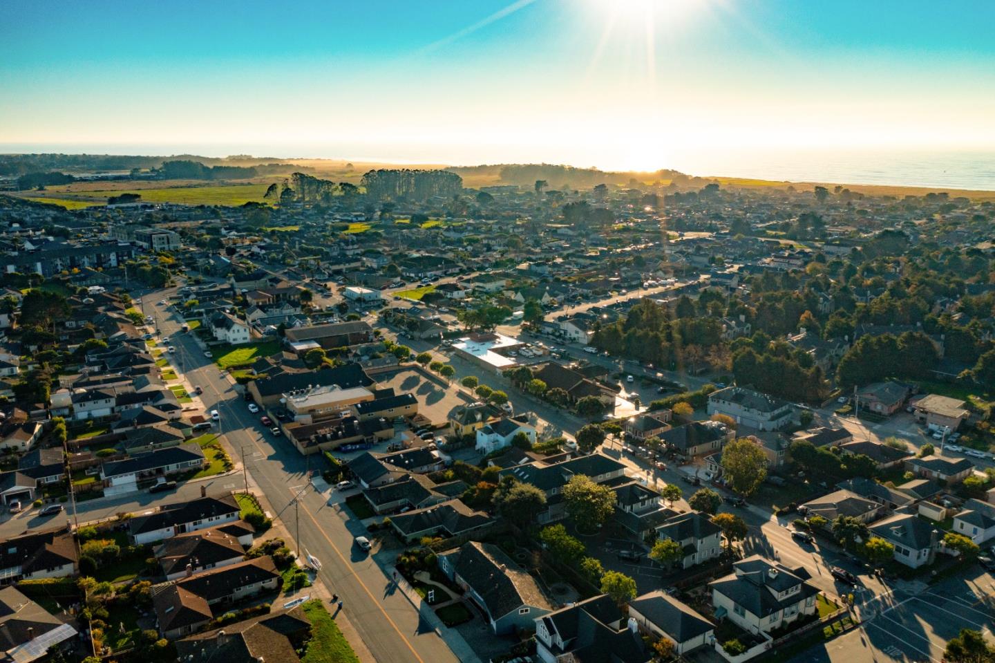 708 Johnston Street Half Moon Bay, CA 94019 - Photo 19 of 41 an aerial view of residential houses with outdoor space and trees
