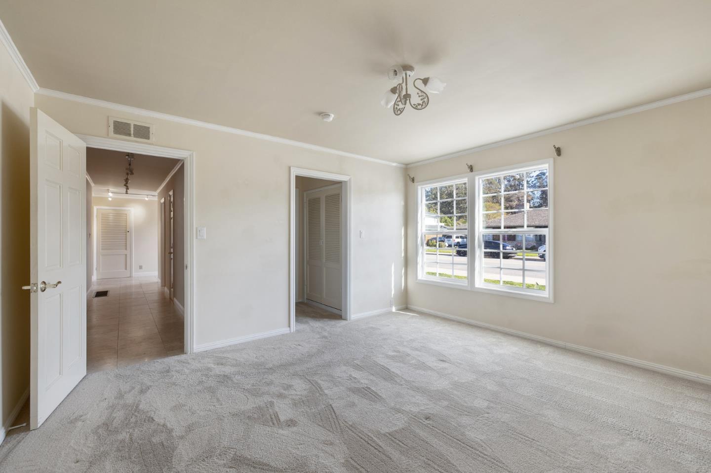 708 Johnston Street Half Moon Bay, CA 94019 - Photo 20 of 41 a view of an empty room with a window