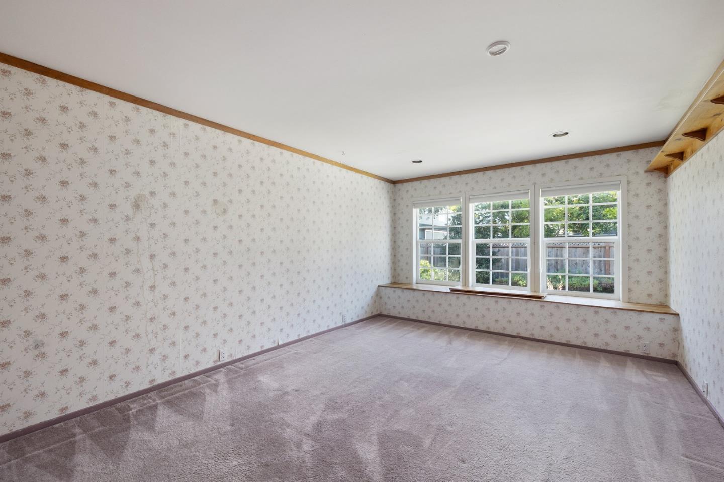 708 Johnston Street Half Moon Bay, CA 94019 - Photo 22 of 41 a view of an empty room with a window