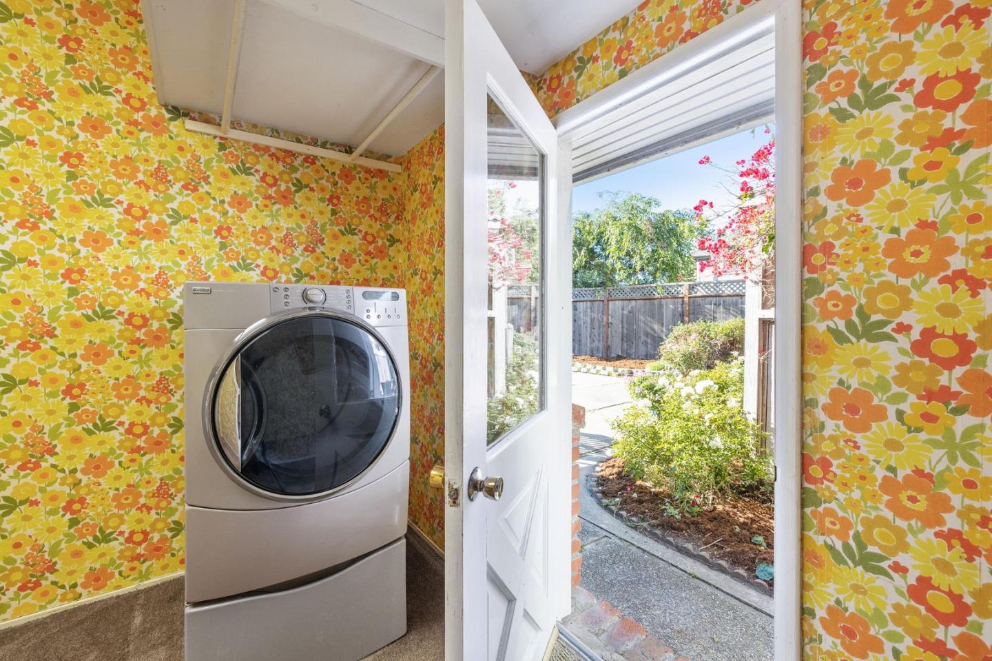 708 Johnston Street Half Moon Bay, CA 94019 - Photo 28 of 41 a view of a door and a window