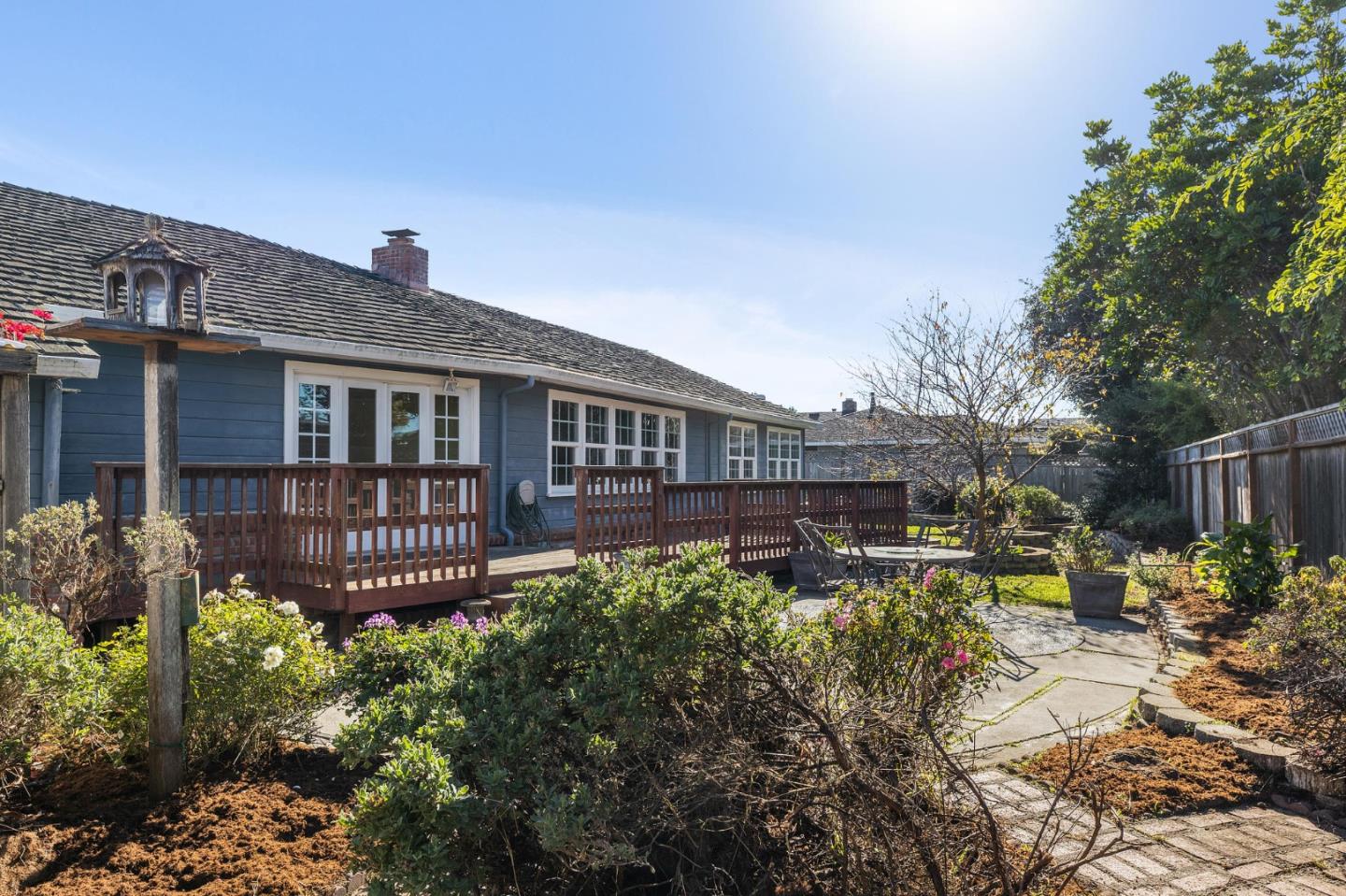 708 Johnston Street Half Moon Bay, CA 94019 - Photo 4 of 41 a view of a house with backyard and sitting area