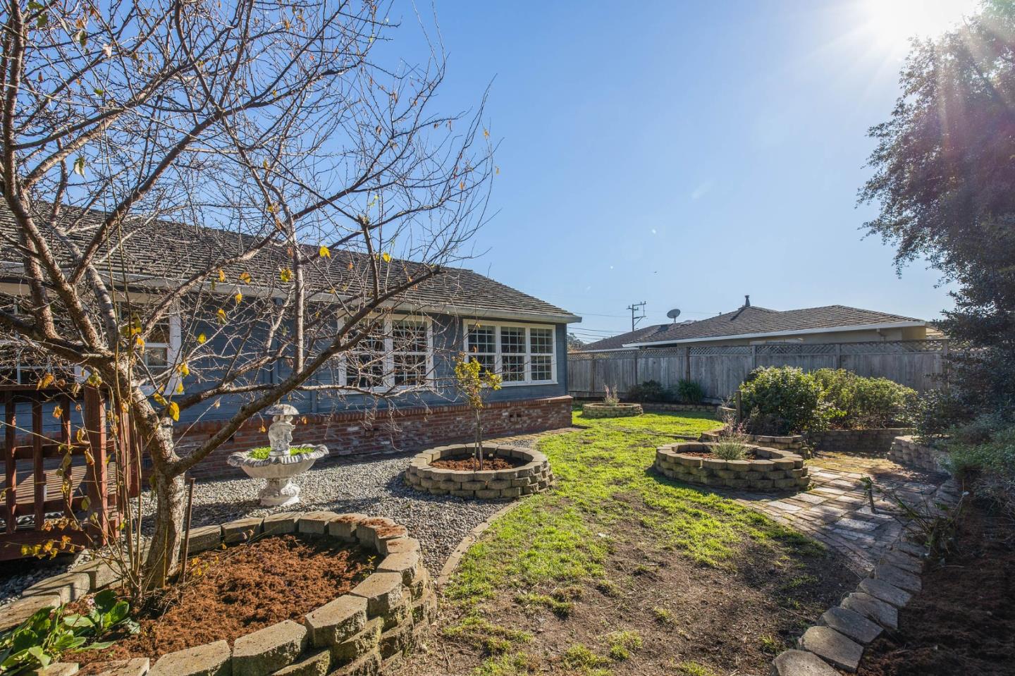 708 Johnston Street Half Moon Bay, CA 94019 - Photo 37 of 41 a front view of a house with a yard