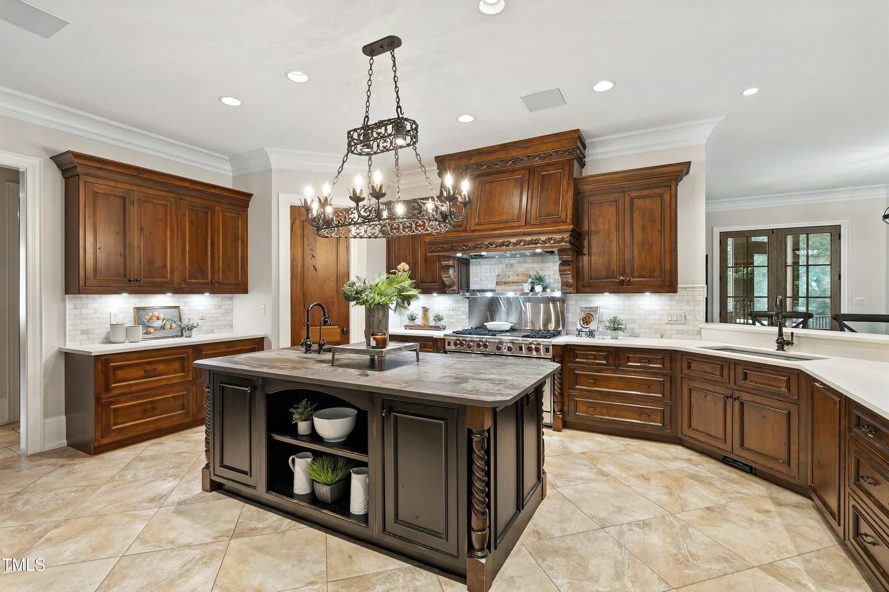 11213 Jonas Ridge Lane Raleigh, NC 27613 - Photo 12 of 91 a kitchen with stainless steel appliances granite countertop stove a sink dishwasher and cabinets with wooden floor