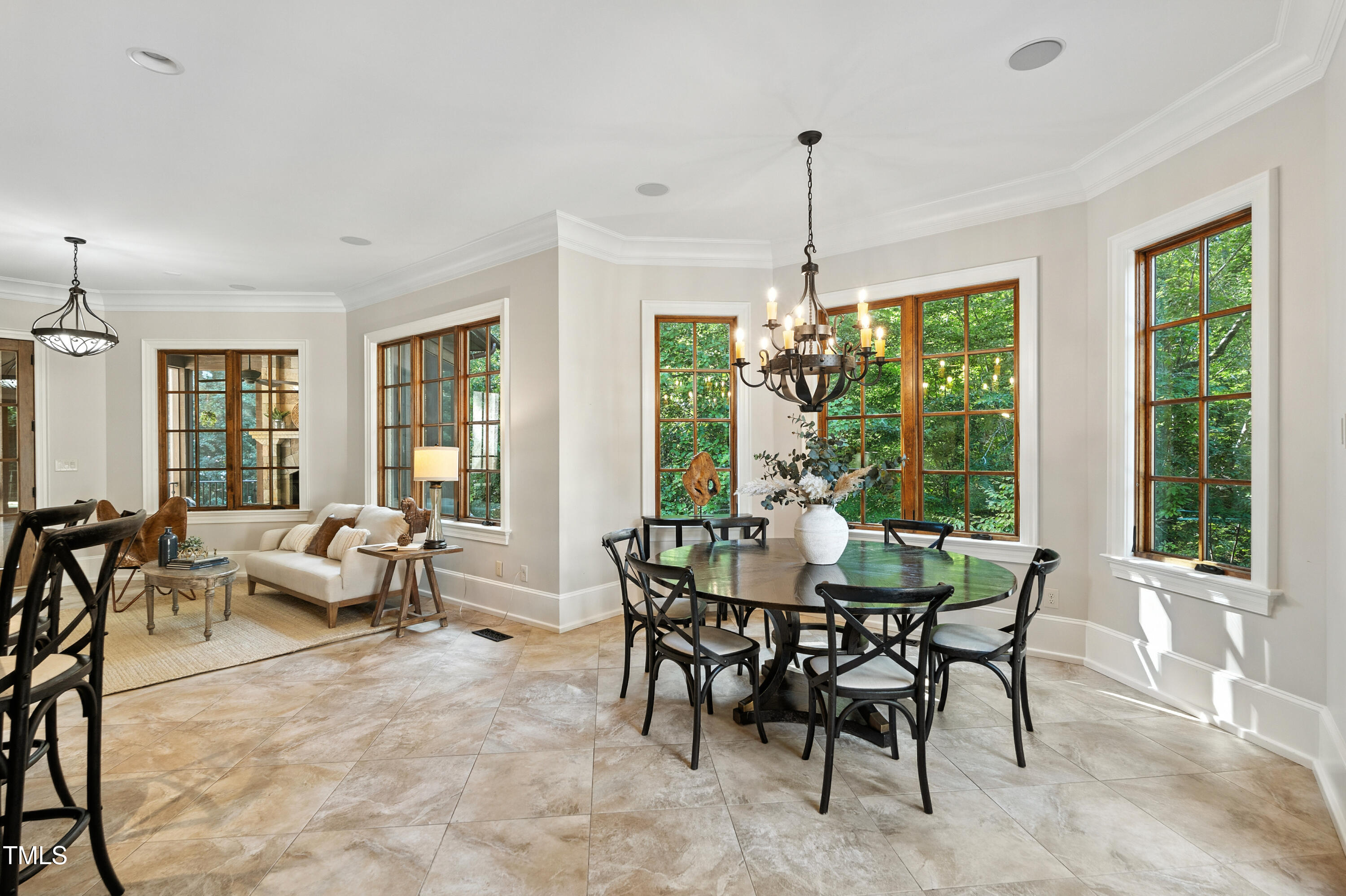 11213 Jonas Ridge Lane Raleigh, NC 27613 - Photo 20 of 91 a view of a dining room with furniture window and outside view