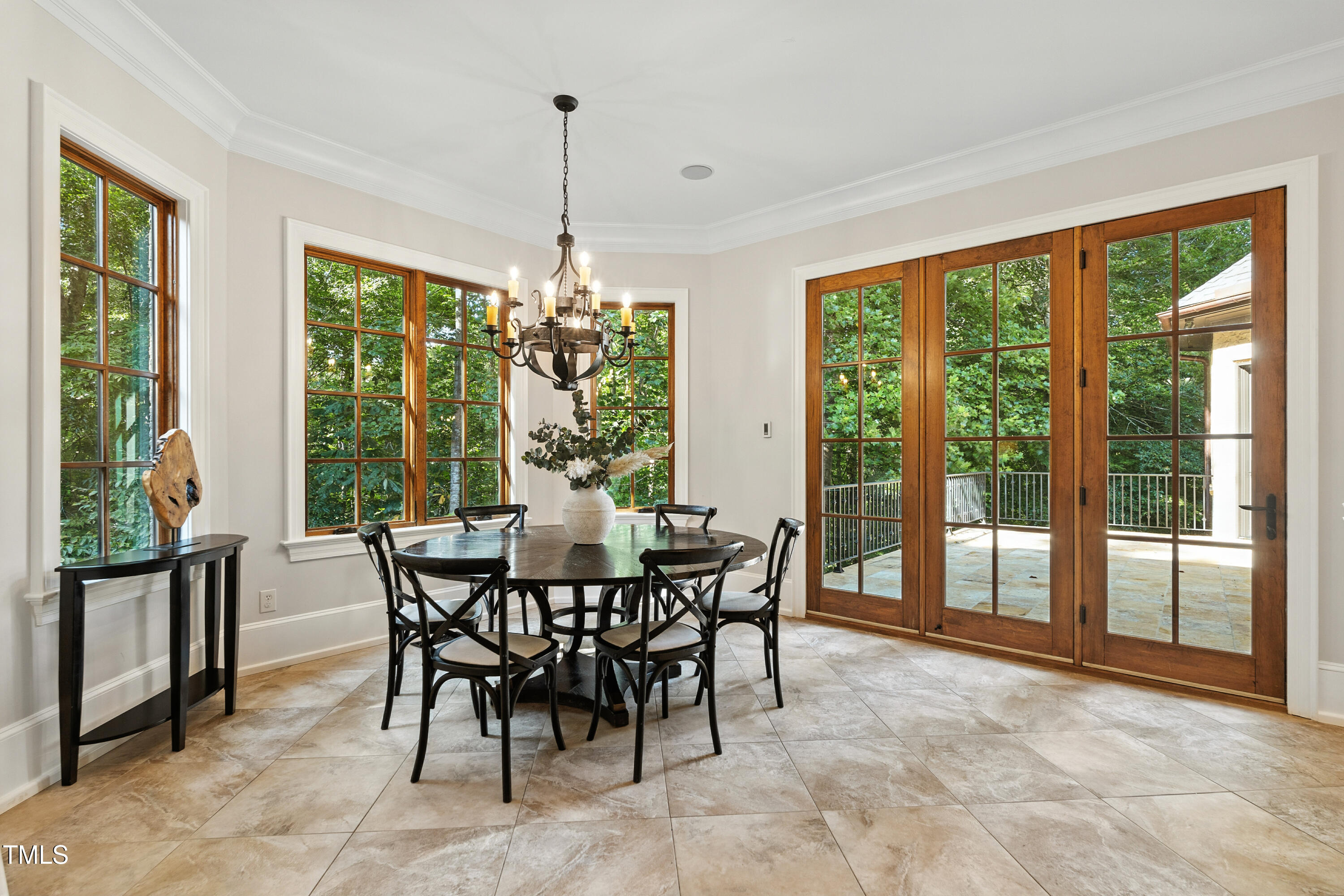 11213 Jonas Ridge Lane Raleigh, NC 27613 - Photo 21 of 91 a view of a dining room with furniture window and outside view