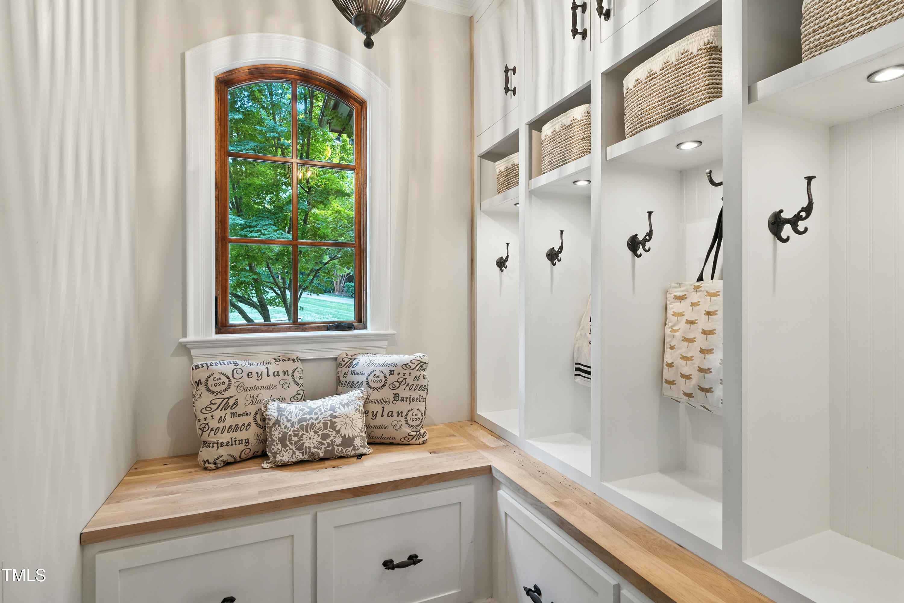 11213 Jonas Ridge Lane Raleigh, NC 27613 - Photo 27 of 91 a bathroom with a granite countertop sink a shower and a mirror