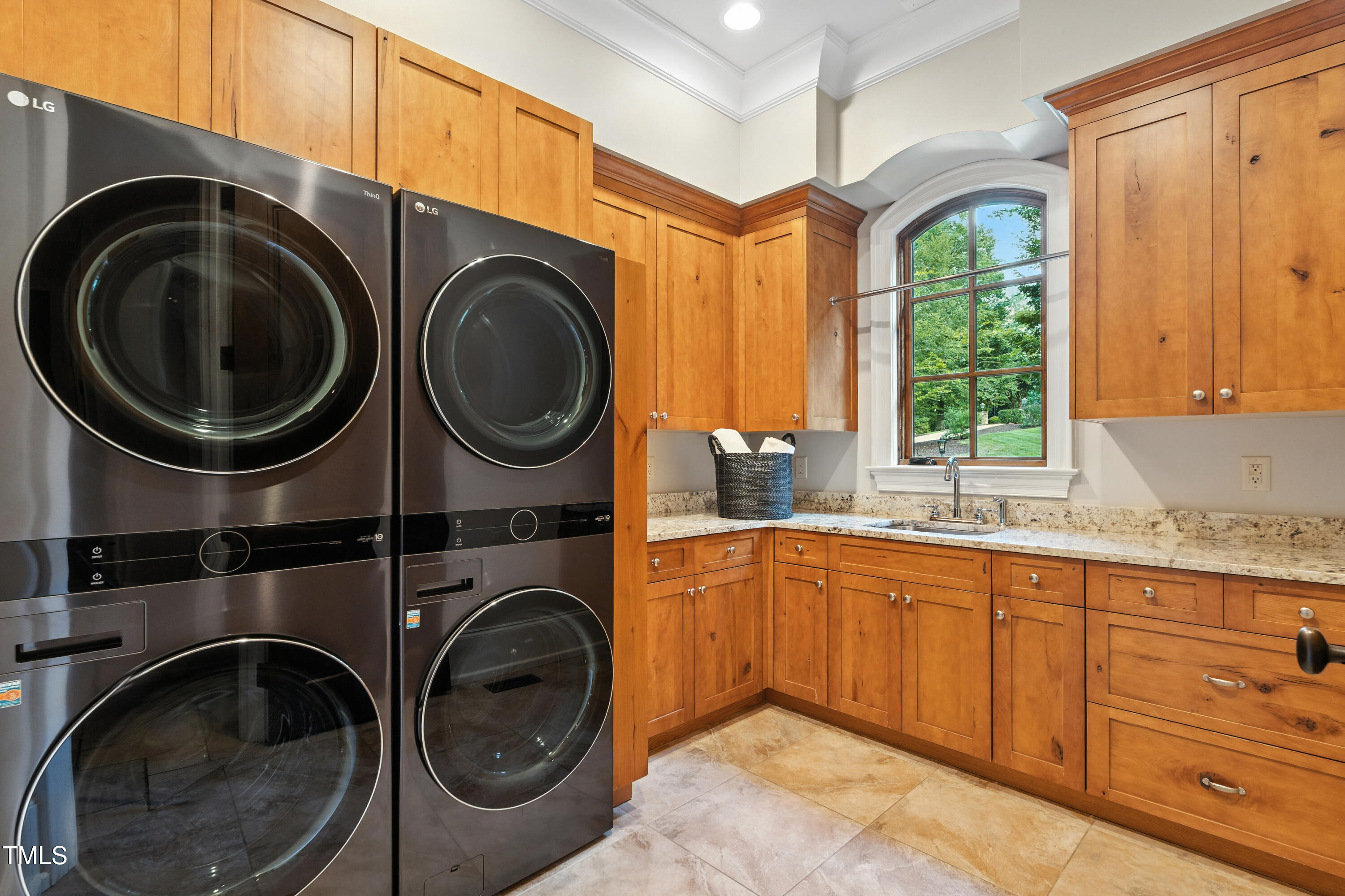 11213 Jonas Ridge Lane Raleigh, NC 27613 - Photo 28 of 91 a utility room with sink dryer and washer