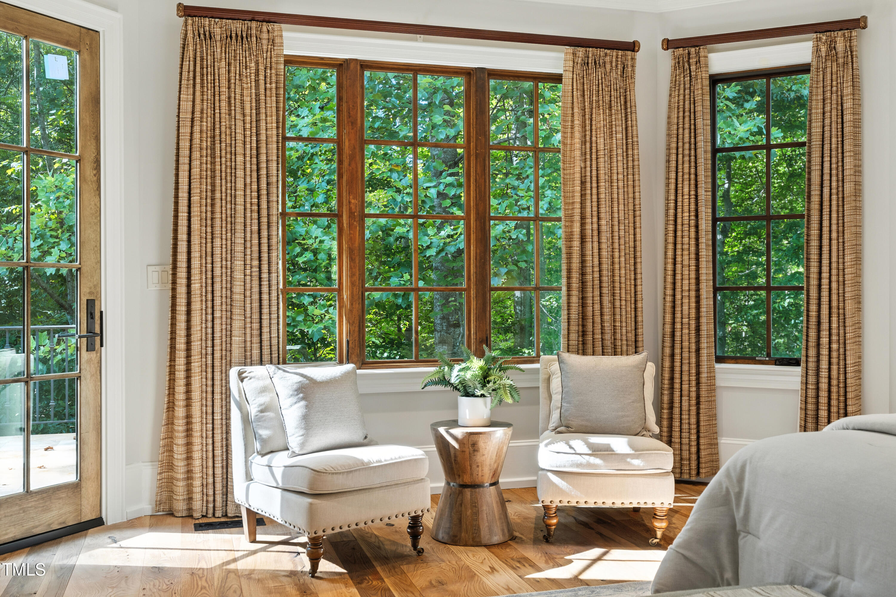 11213 Jonas Ridge Lane Raleigh, NC 27613 - Photo 36 of 91 a living room with furniture and a window