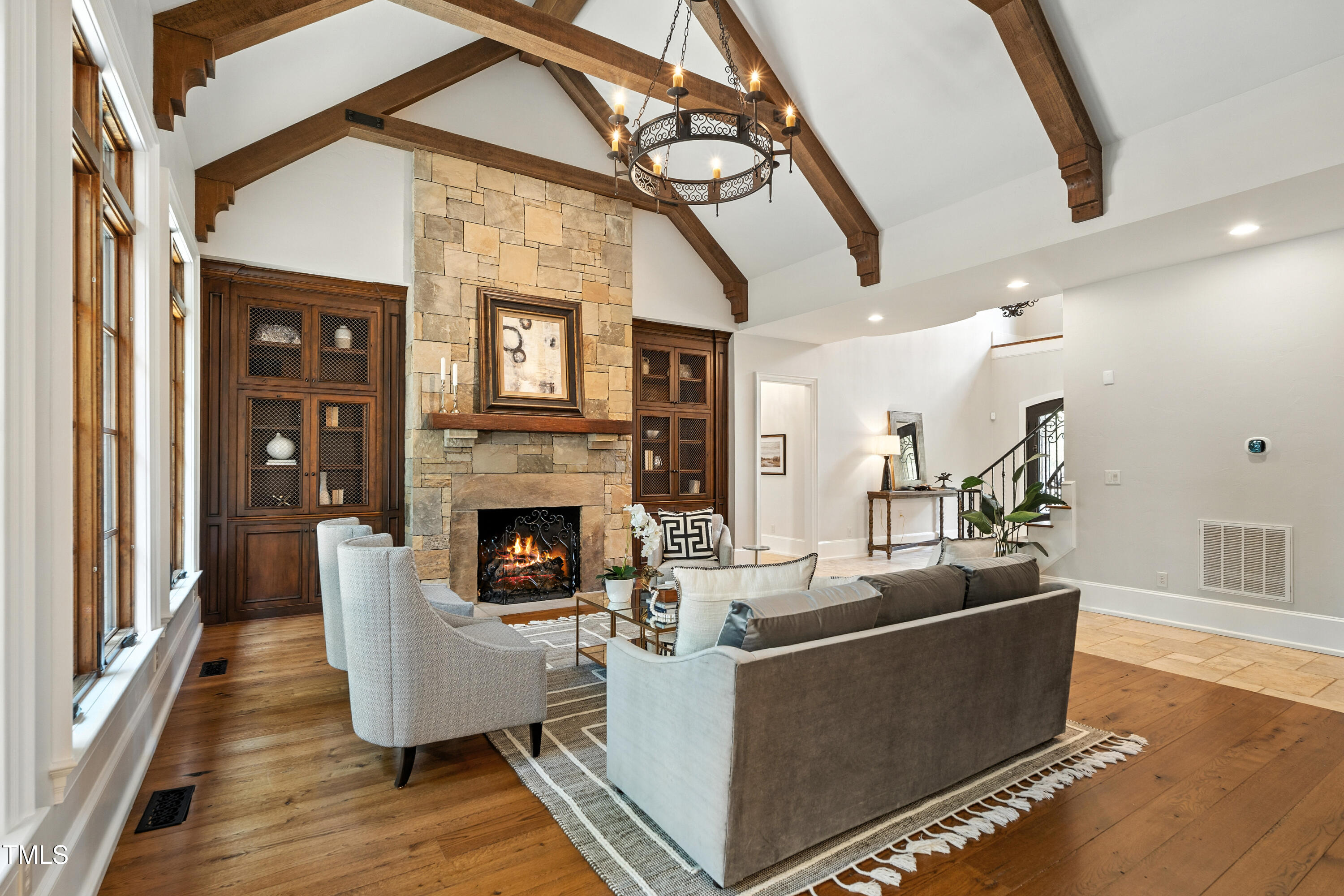 11213 Jonas Ridge Lane Raleigh, NC 27613 - Photo 4 of 91 a living room with fireplace furniture and a wooden floor