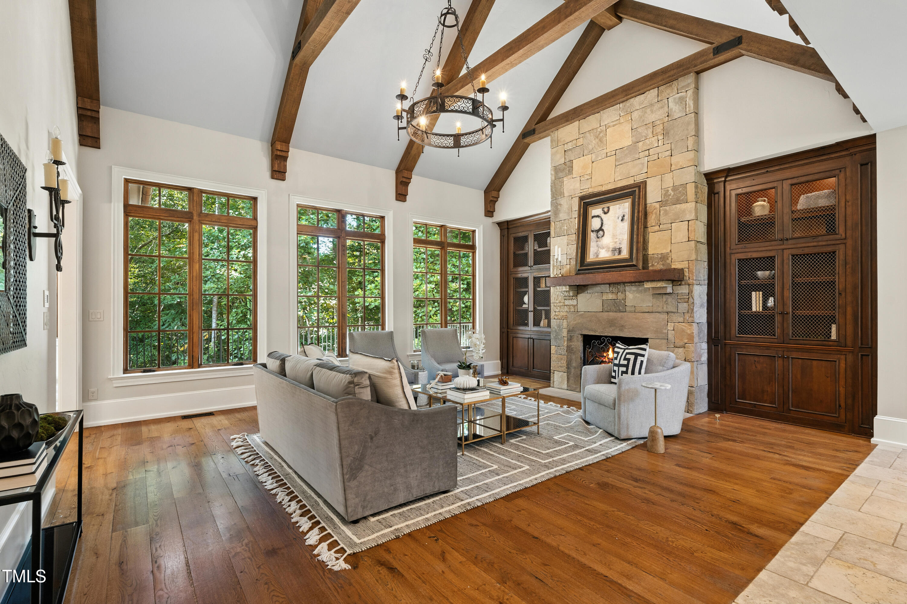 11213 Jonas Ridge Lane Raleigh, NC 27613 - Photo 6 of 91 a living room with furniture large window and wooden floor