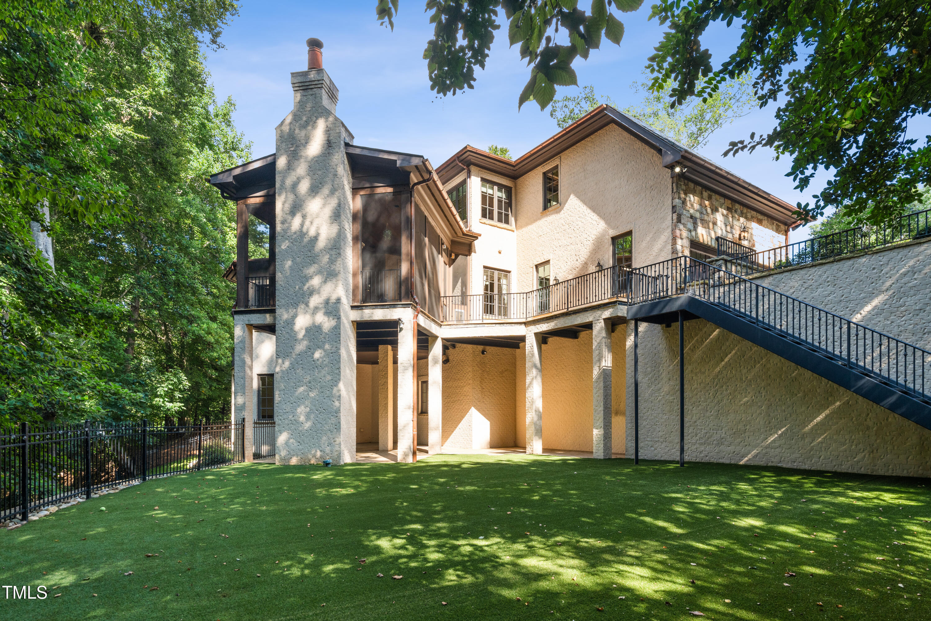 11213 Jonas Ridge Lane Raleigh, NC 27613 - Photo 71 of 91 a view of a big house with a big yard and large trees