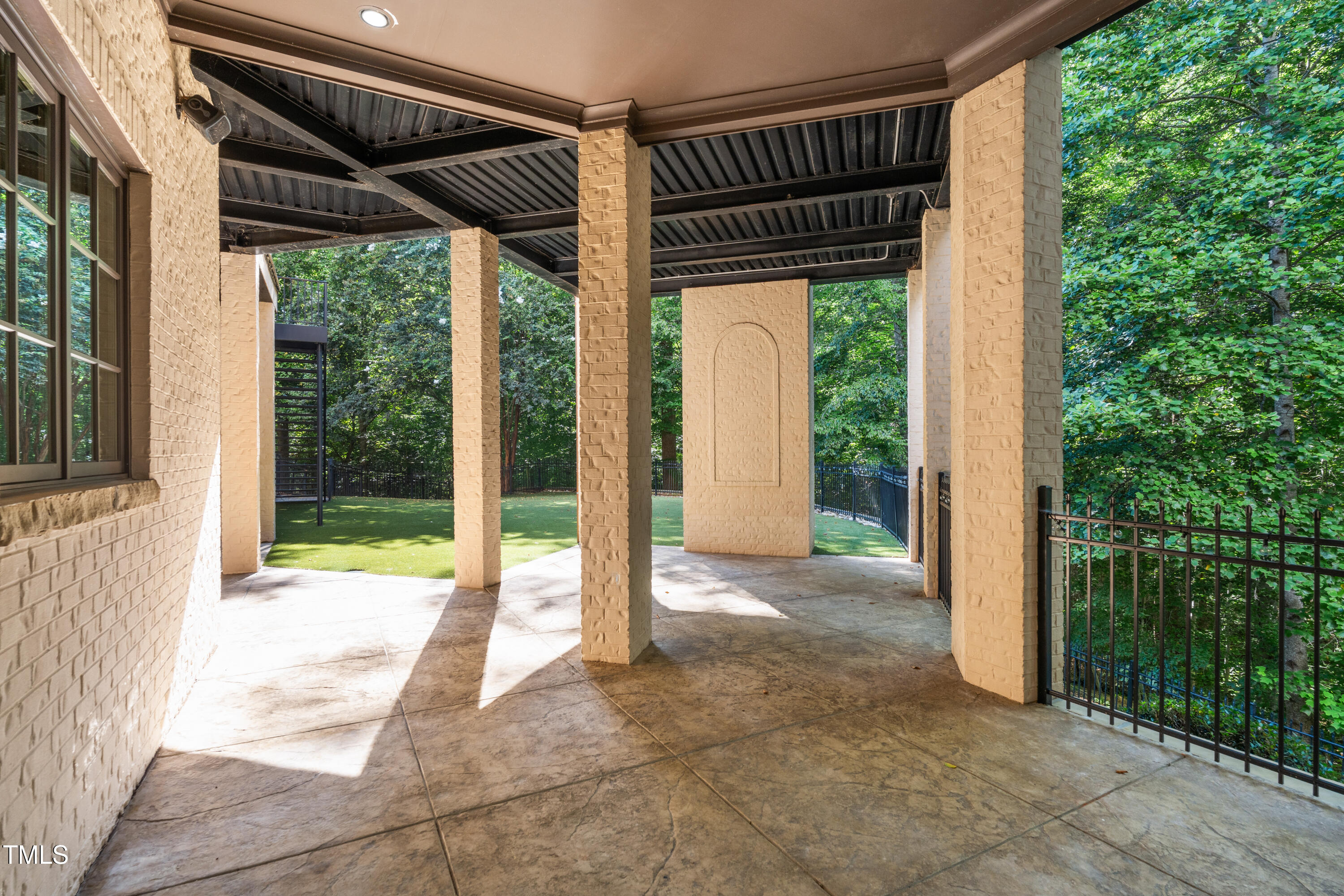11213 Jonas Ridge Lane Raleigh, NC 27613 - Photo 72 of 91 a view of a room with wooden floor and outdoor space