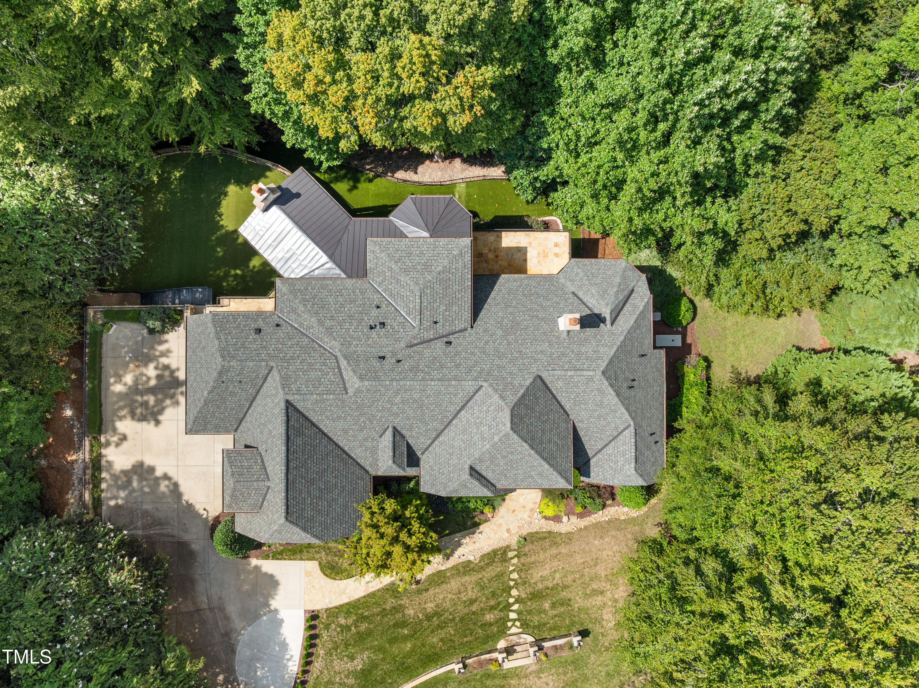 11213 Jonas Ridge Lane Raleigh, NC 27613 - Photo 80 of 91 an aerial view of a house with a yard and large trees