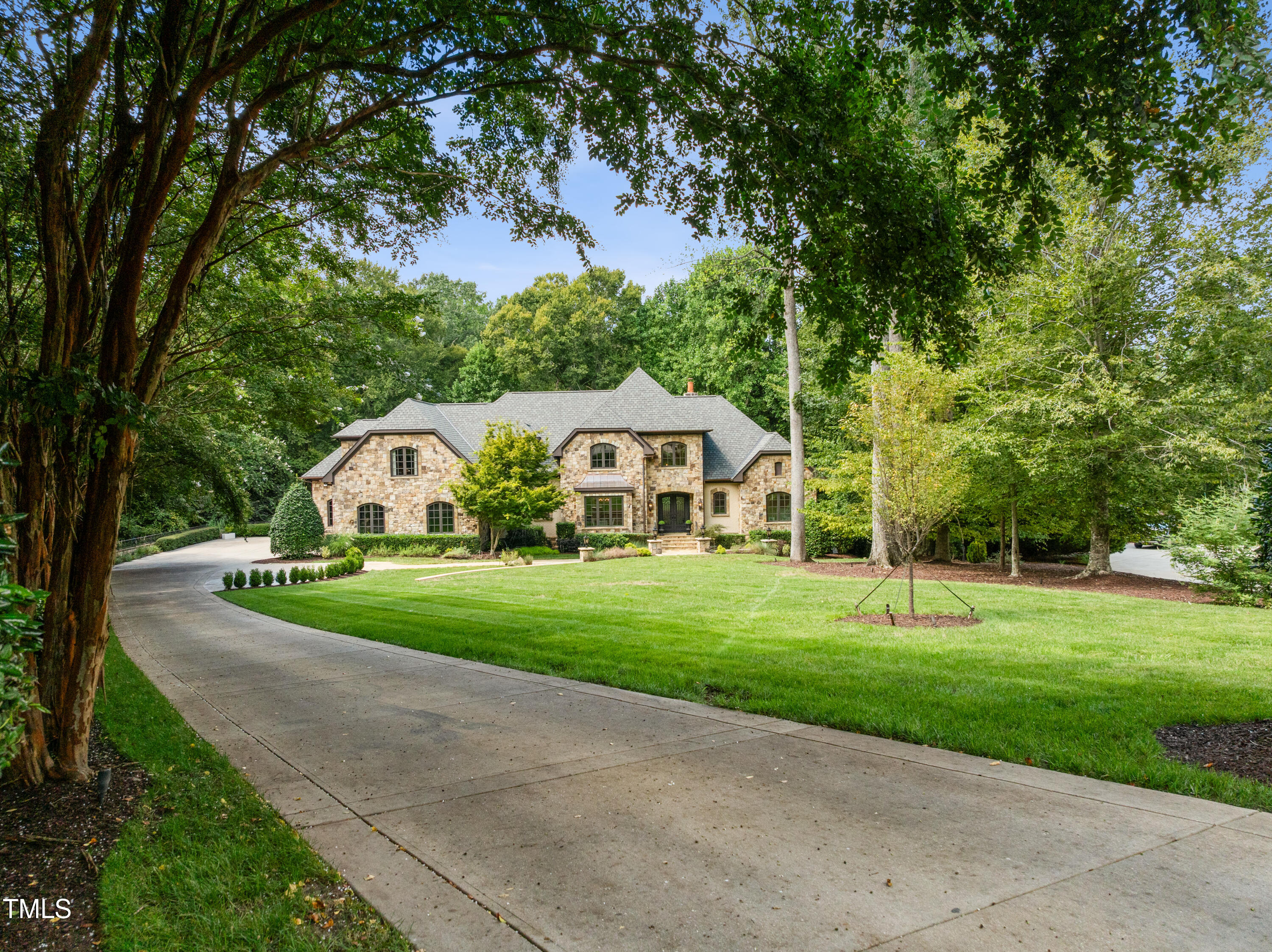 11213 Jonas Ridge Lane Raleigh, NC 27613 - Photo 82 of 91 a front view of a house with garden