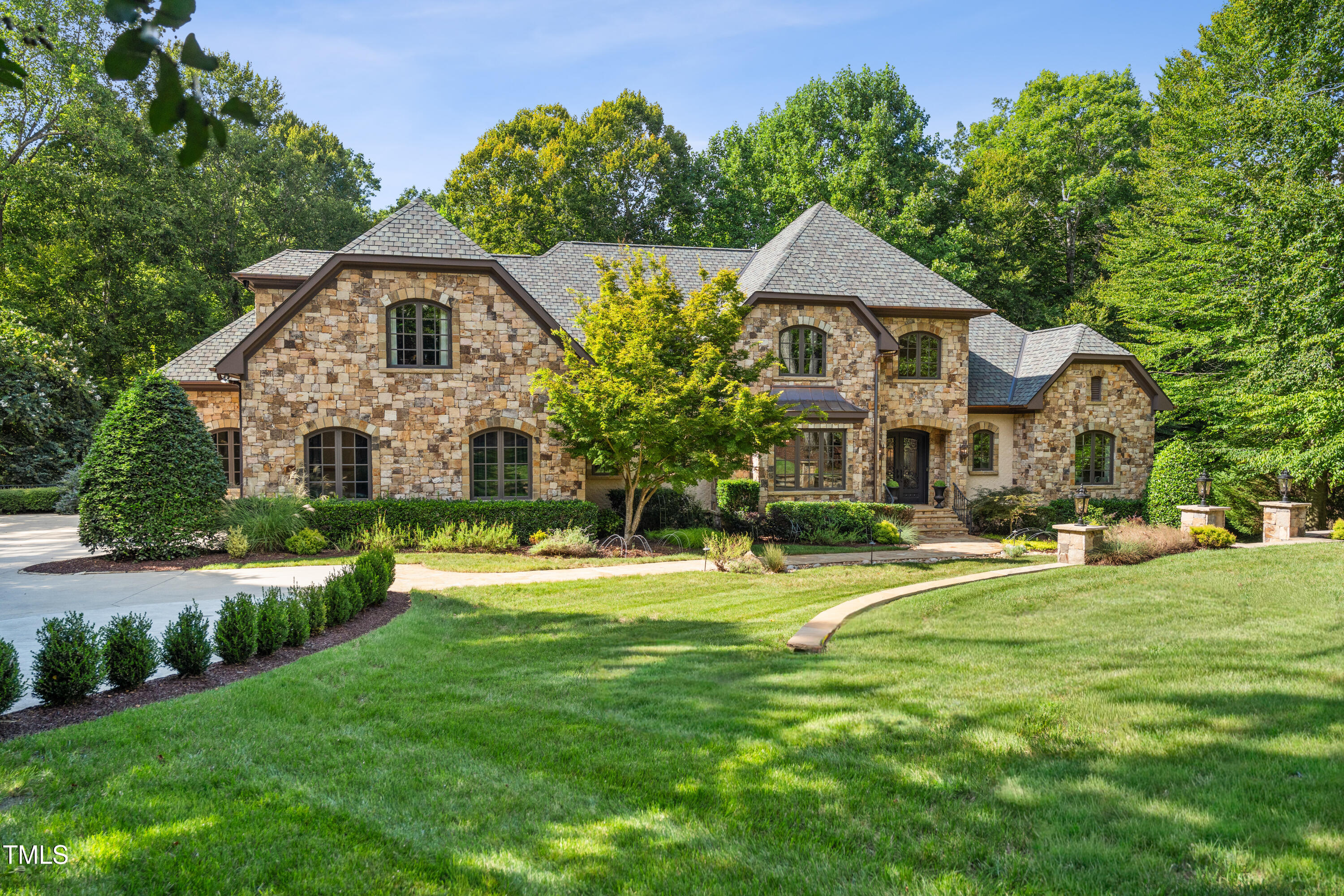 11213 Jonas Ridge Lane Raleigh, NC 27613 - Photo 83 of 91 a front view of a house with a yard and porch