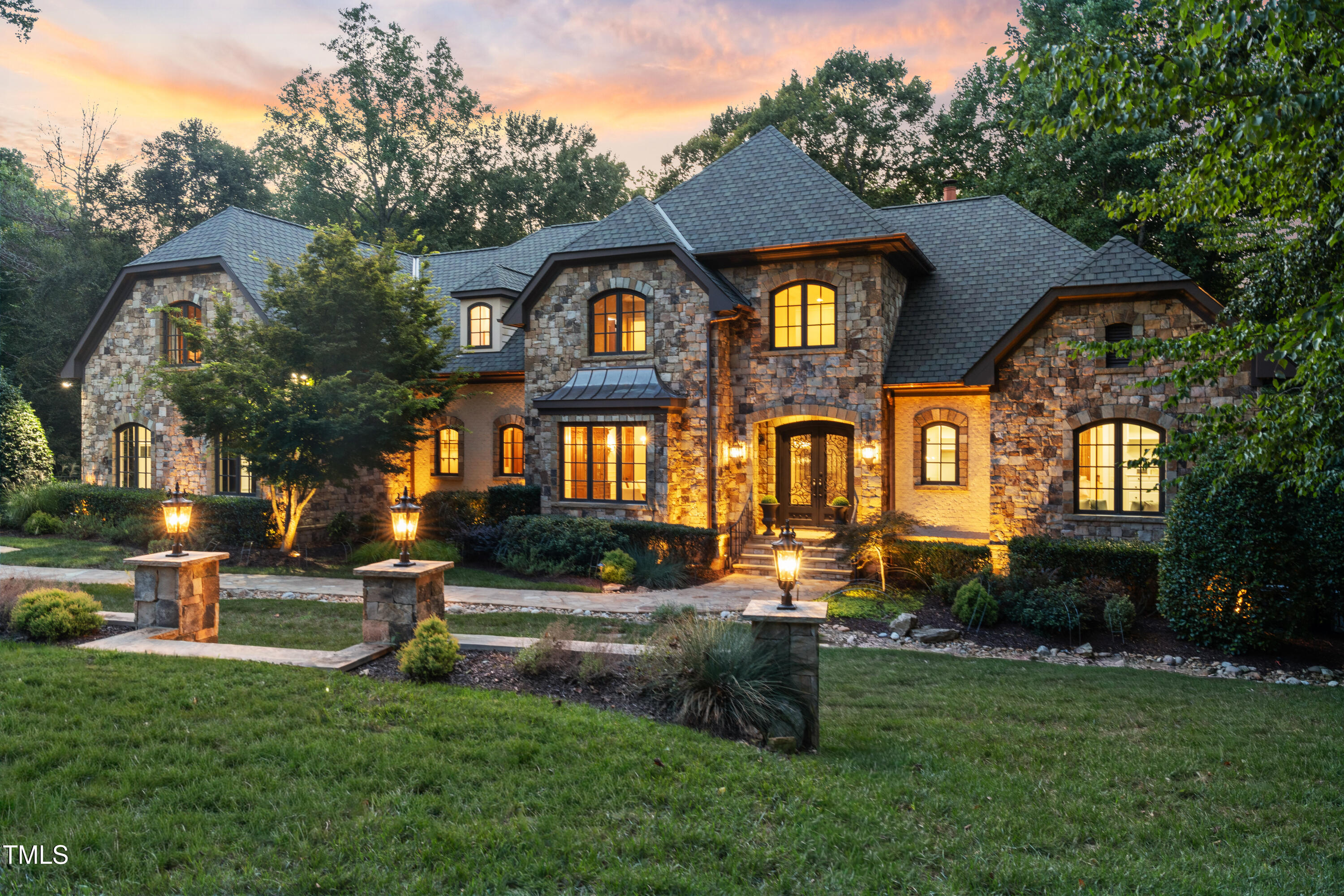 11213 Jonas Ridge Lane Raleigh, NC 27613 - Photo 84 of 91 a front view of a house with garden
