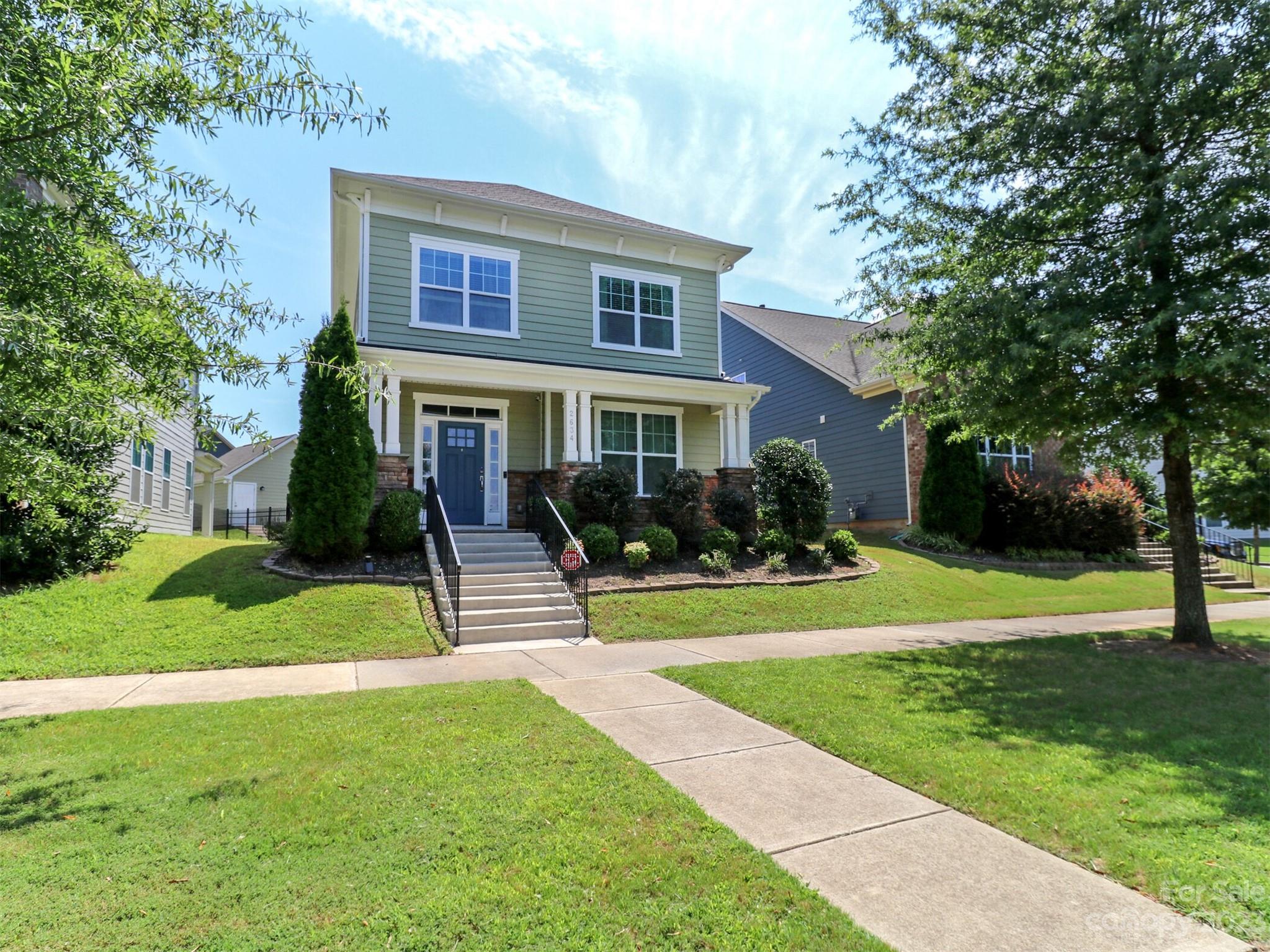 2634 Double Oaks Road Charlotte, NC 28206 - Photo 2 of 48 a view of a house with a yard