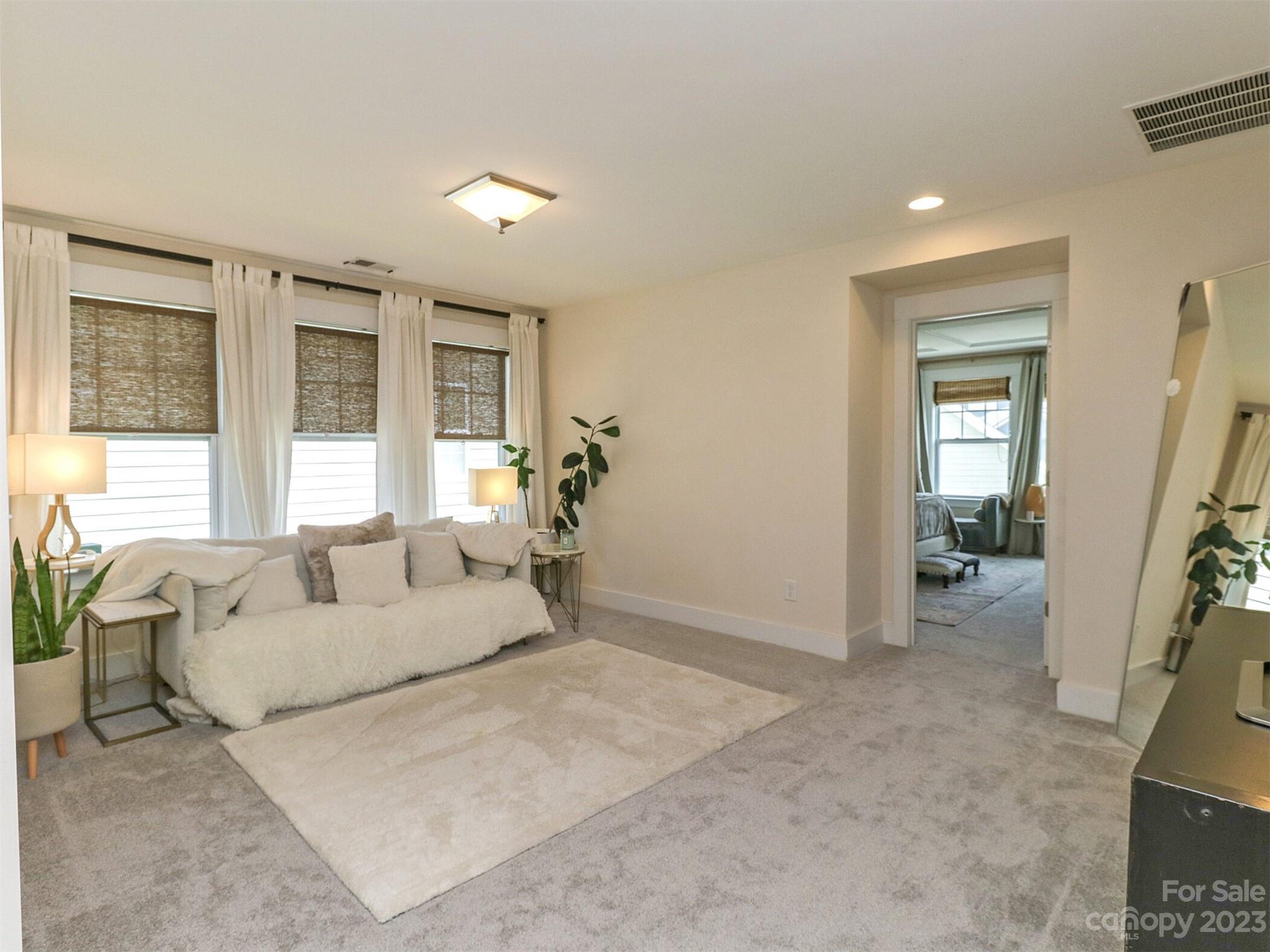2634 Double Oaks Road Charlotte, NC 28206 - Photo 24 of 48 a living room with furniture and a large window