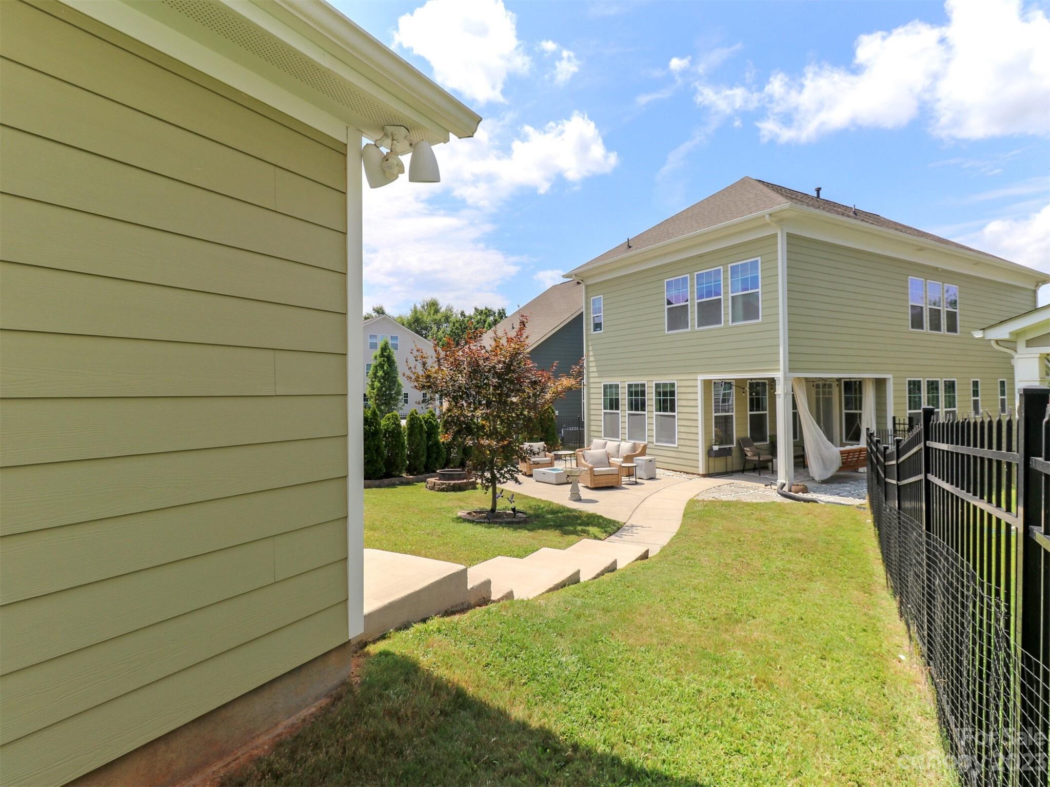 2634 Double Oaks Road Charlotte, NC 28206 - Photo 35 of 48 a view of a house with backyard and sitting area