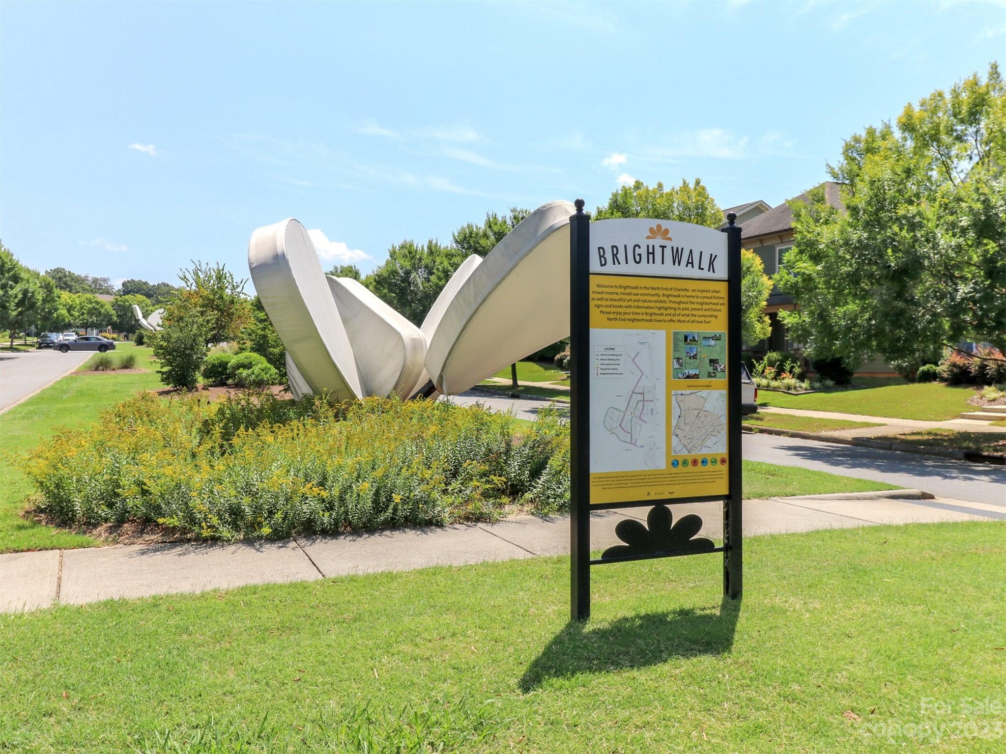 2634 Double Oaks Road Charlotte, NC 28206 - Photo 45 of 48 a view of a park with swings and slides