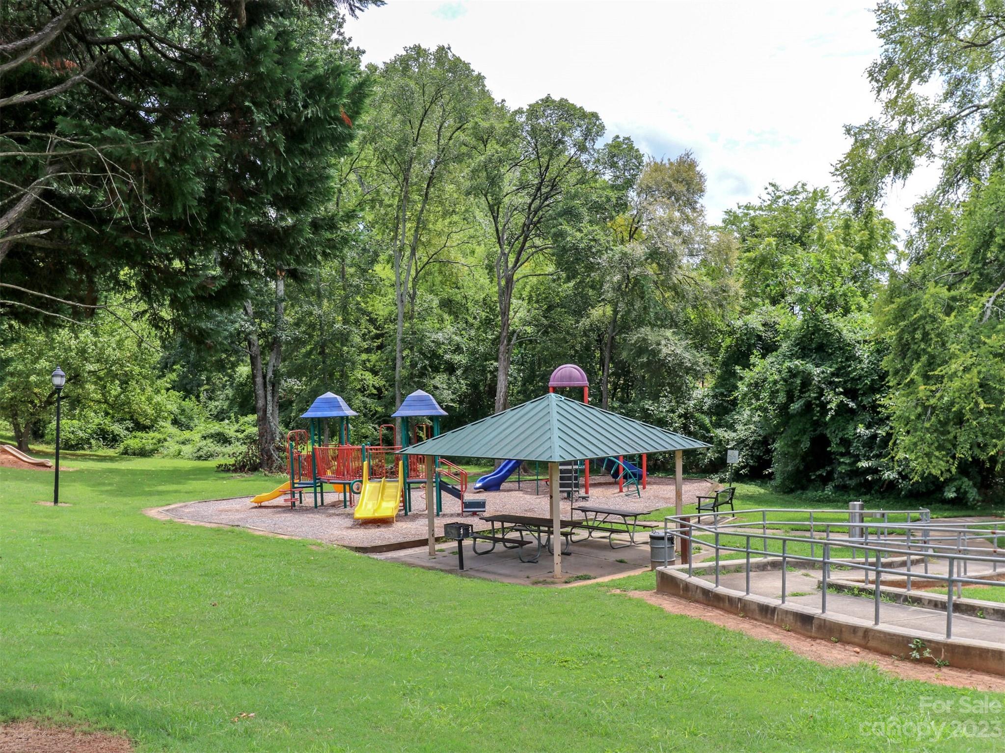 2634 Double Oaks Road Charlotte, NC 28206 - Photo 47 of 48 an outdoor space with furniture and umbrella
