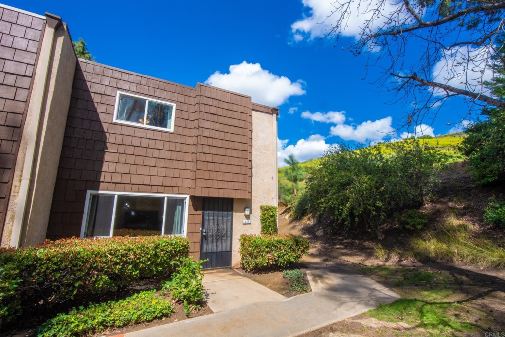 11253 Via Madonna Santee, CA 92071 - Photo 1 of 1 a front view of a house with a yard