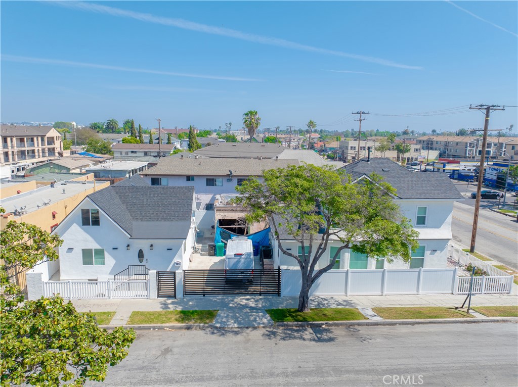 1014 Myrtle Avenue Long Beach, CA 90813 - Photo 1 of 70 a aerial view of a house with garden space and tall buildings