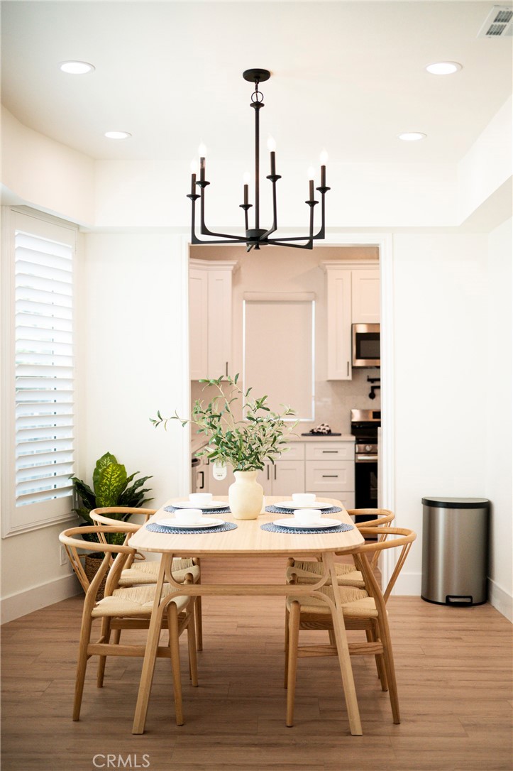 1014 Myrtle Avenue Long Beach, CA 90813 - Photo 11 of 70 a dining room with furniture and wooden floor