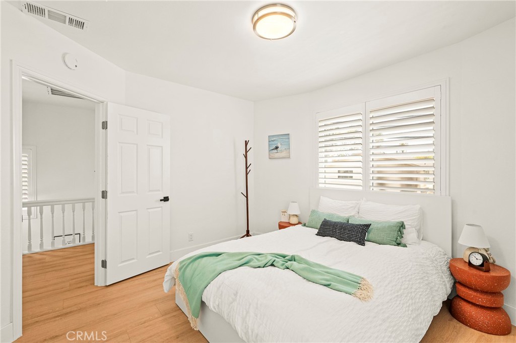 1014 Myrtle Avenue Long Beach, CA 90813 - Photo 26 of 70 a bedroom with a bed and a window