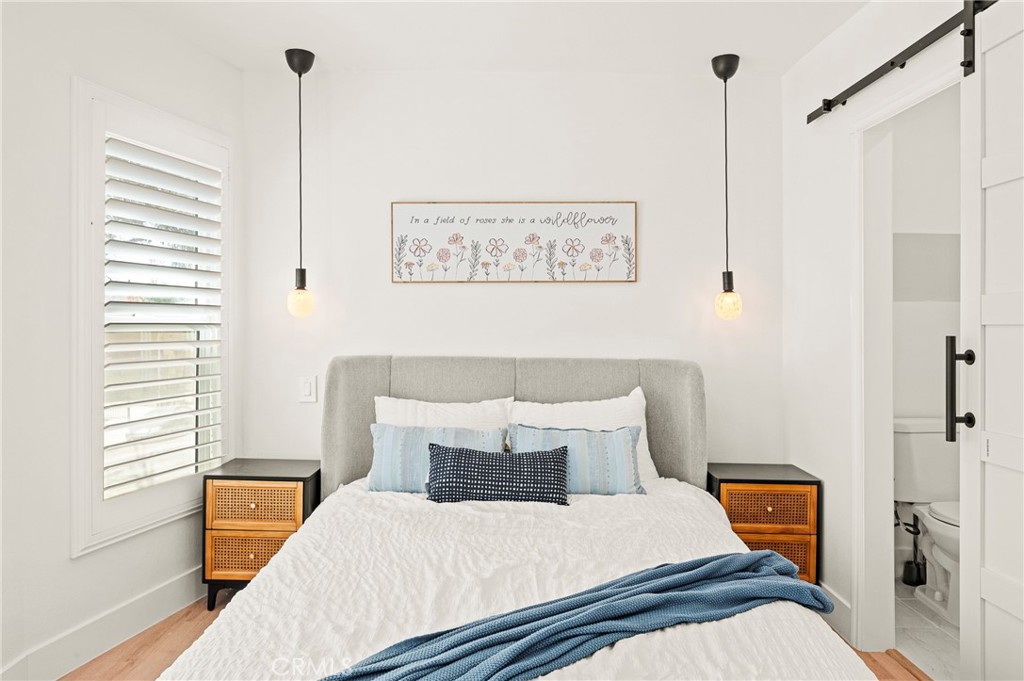 1014 Myrtle Avenue Long Beach, CA 90813 - Photo 29 of 70 a bedroom with a bed and a window