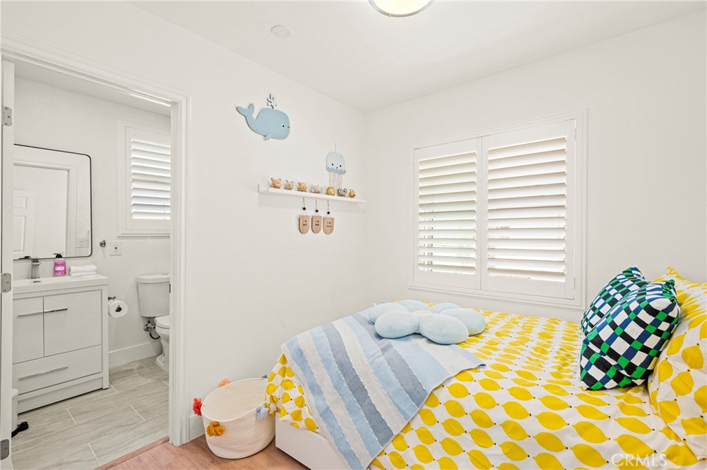 1014 Myrtle Avenue Long Beach, CA 90813 - Photo 32 of 70 a bedroom with a bed and a window