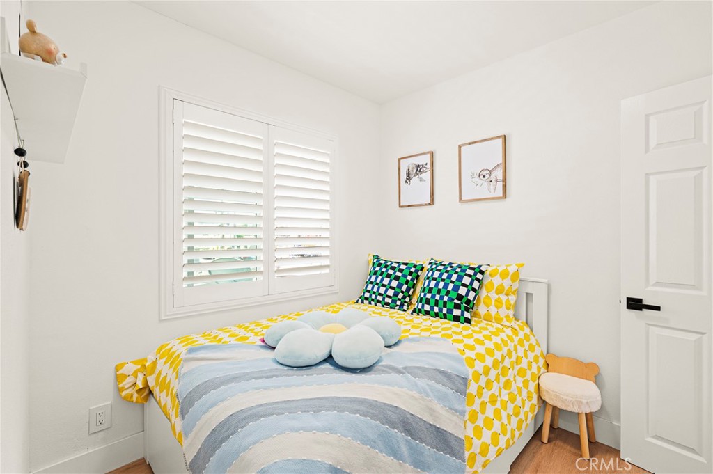 1014 Myrtle Avenue Long Beach, CA 90813 - Photo 33 of 70 a bedroom with a bed and a window