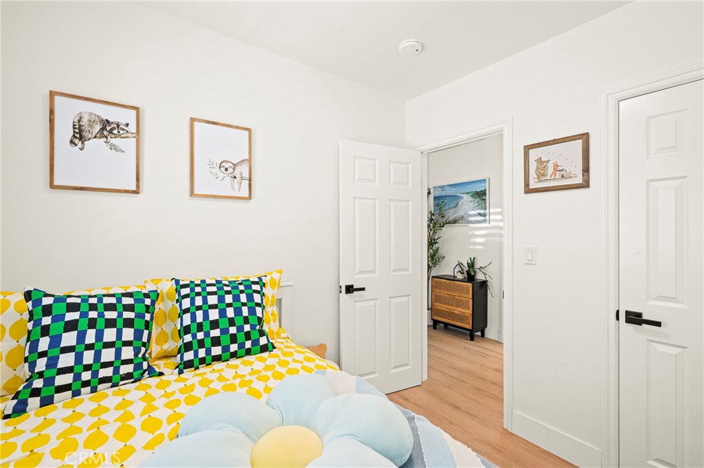 1014 Myrtle Avenue Long Beach, CA 90813 - Photo 34 of 70 a bedroom with furniture and a wooden floor