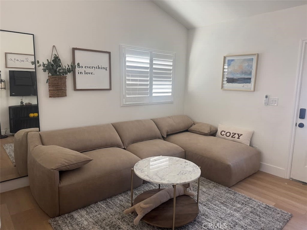 1014 Myrtle Avenue Long Beach, CA 90813 - Photo 38 of 70 a living room with furniture and a window