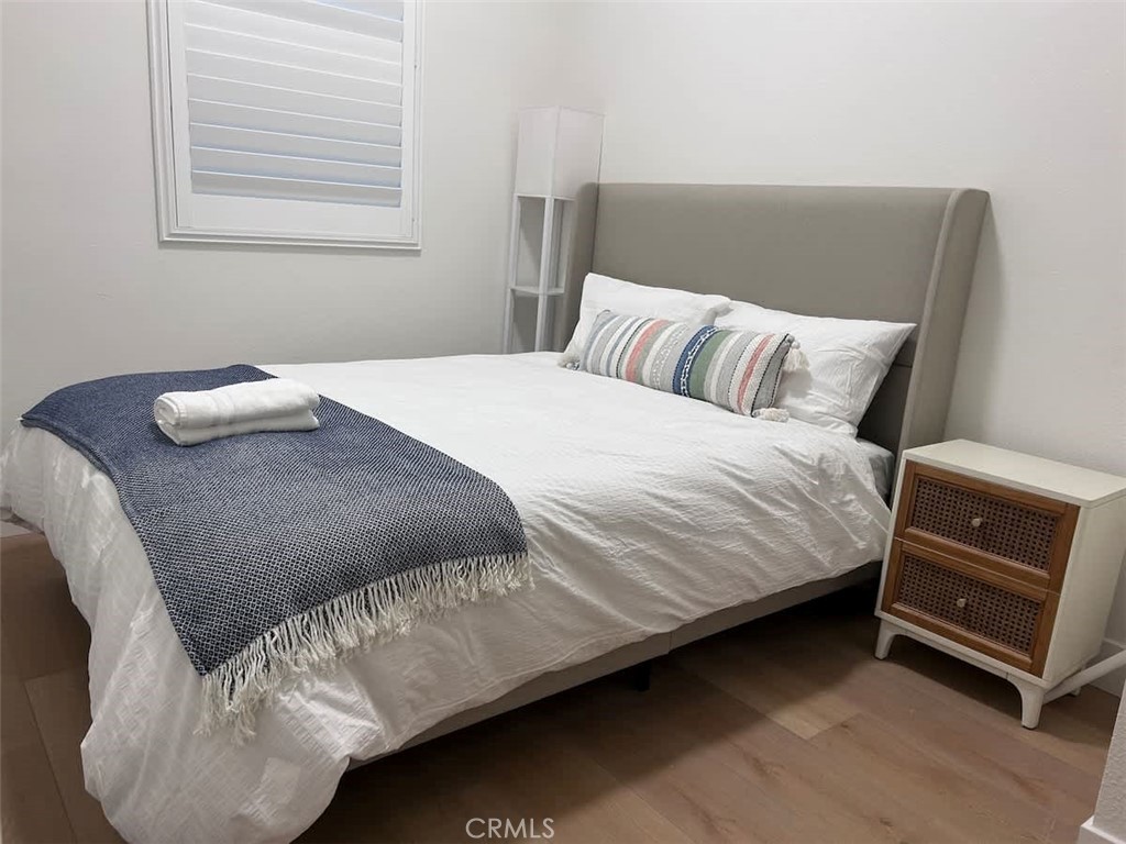 1014 Myrtle Avenue Long Beach, CA 90813 - Photo 50 of 70 a bedroom with a bed and a couch