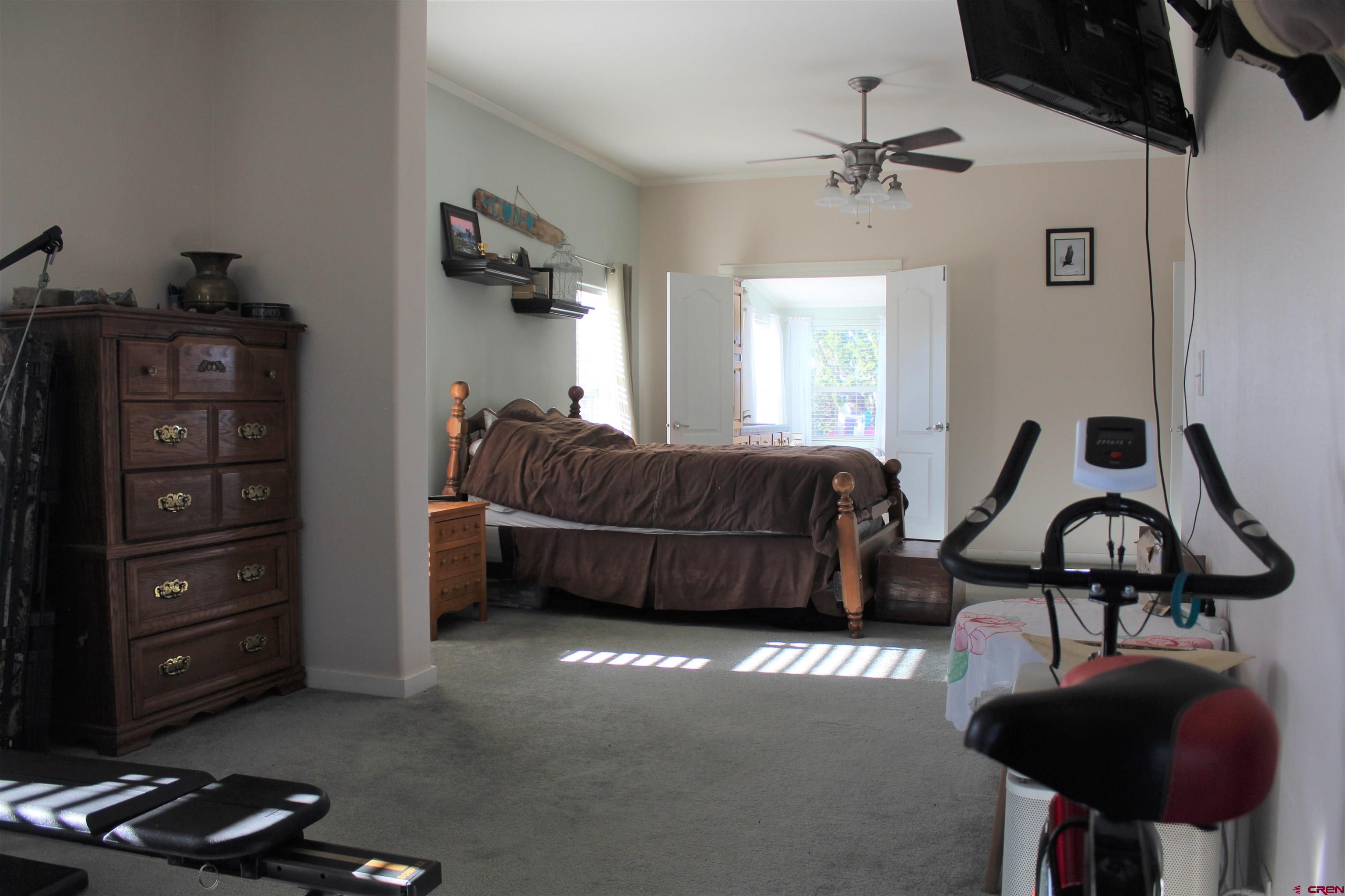 16875 Ember Road Cedaredge, CO 81413 - Photo 17 of 31 a living room with furniture and a window