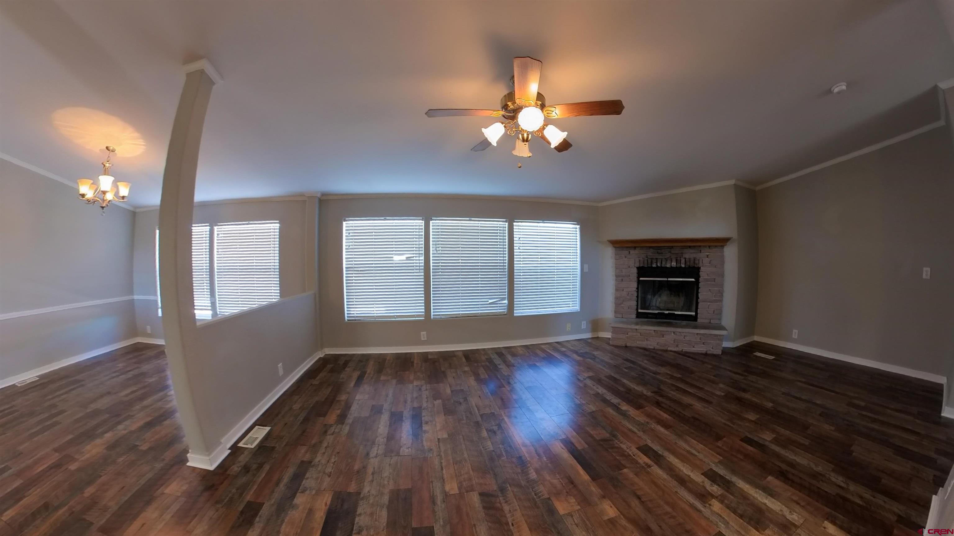 16875 Ember Road Cedaredge, CO 81413 - Photo 29 of 31 a view of an empty room with wooden floor and a window